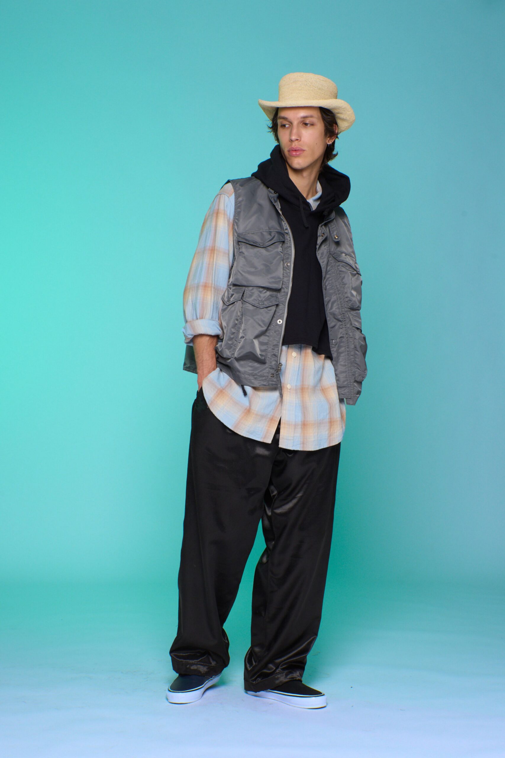 gray vest with black hoodie