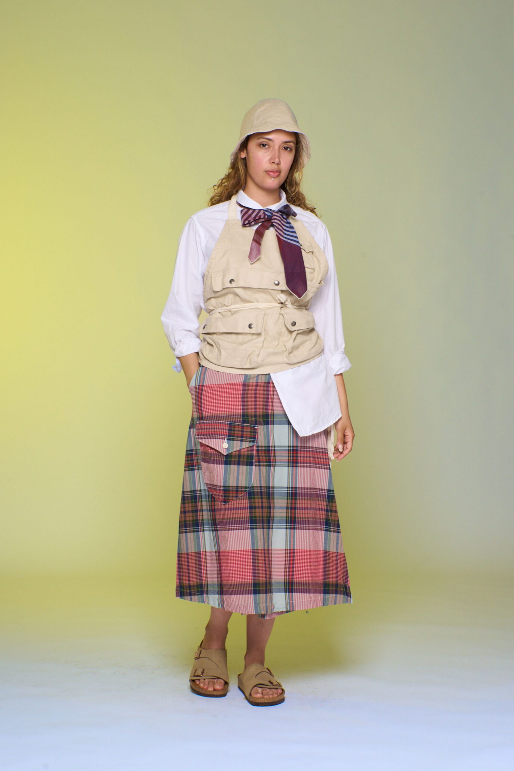relaxed white shirt beige vest midi skirt