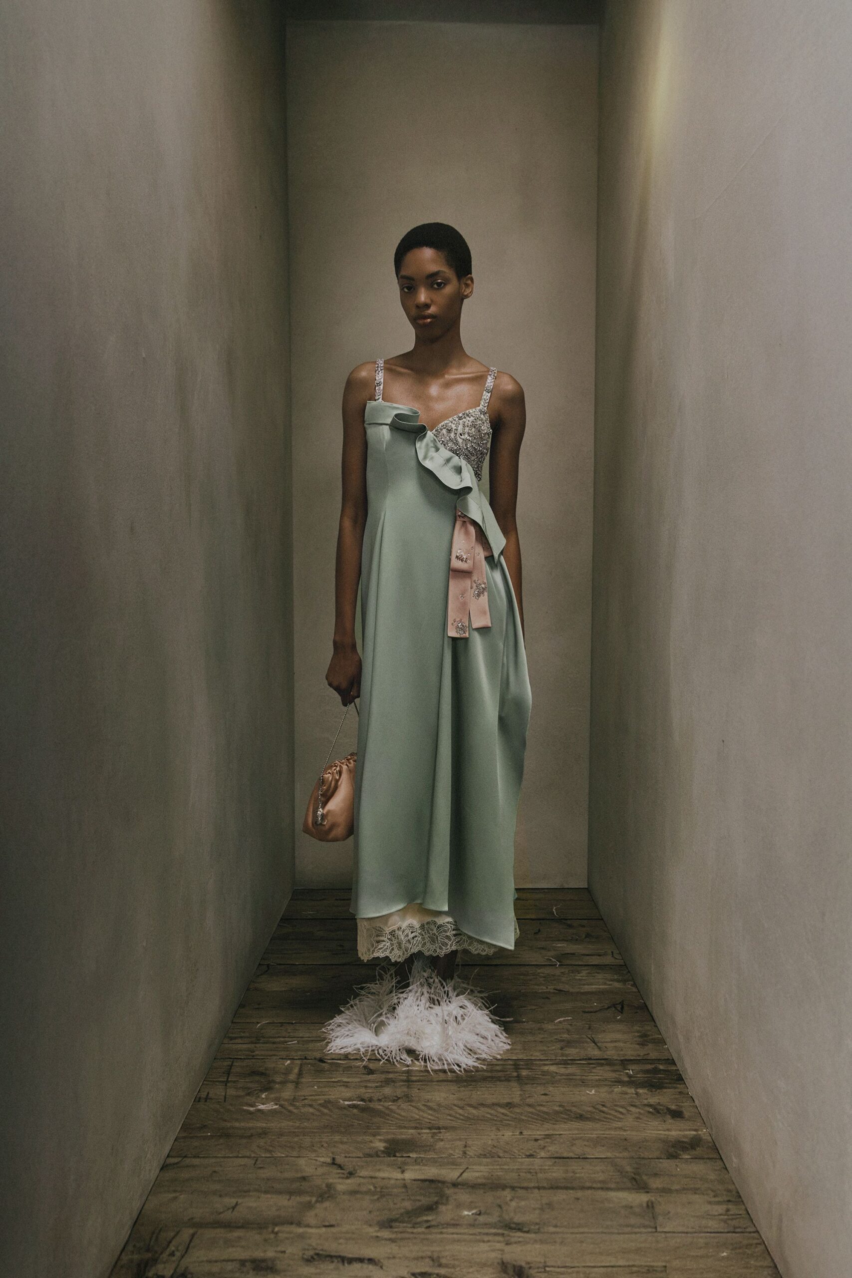 green silk sleeveless v-neck fitted draped tiered dress