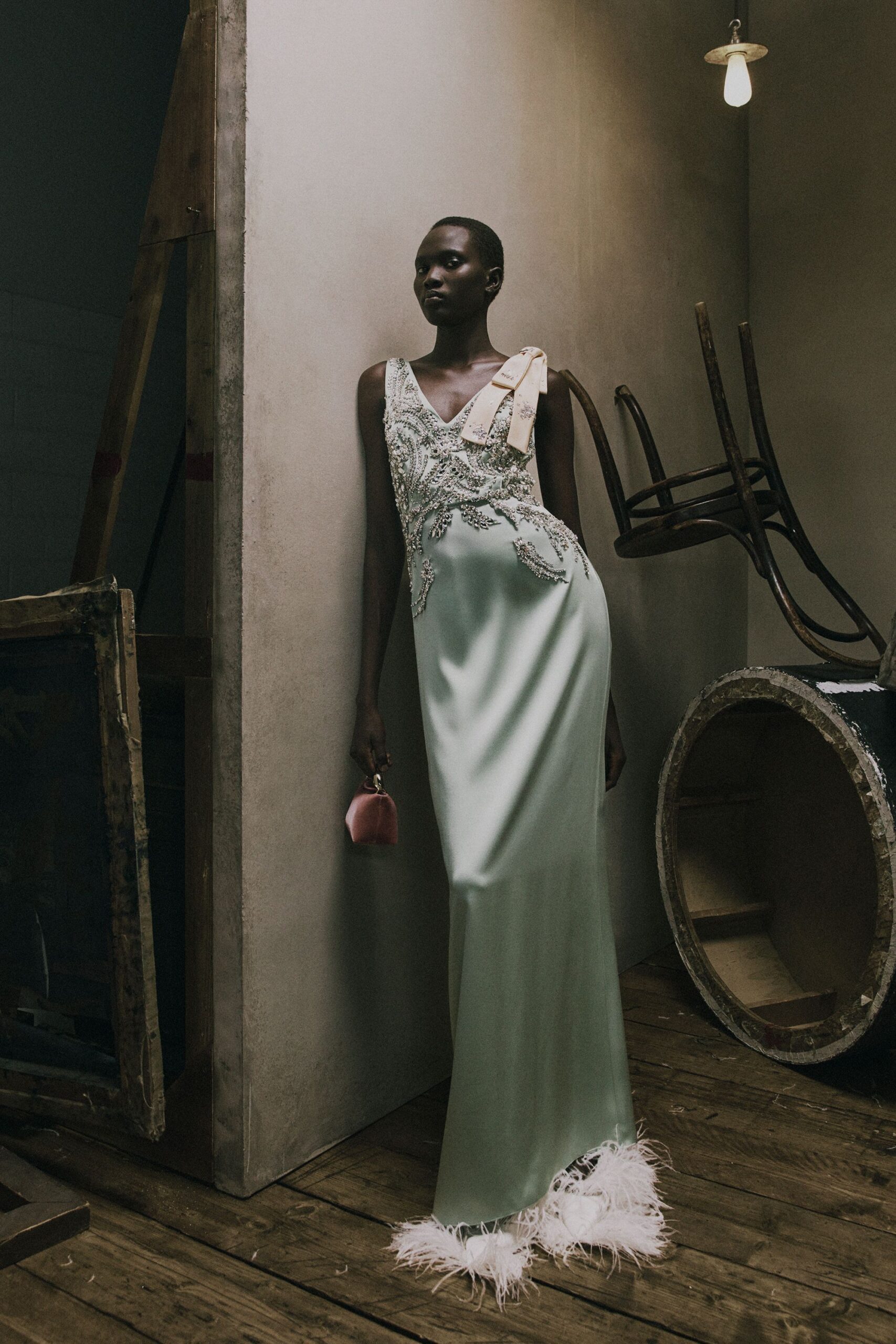 green silk sleeveless v-neck fitted embroidered tiered gown