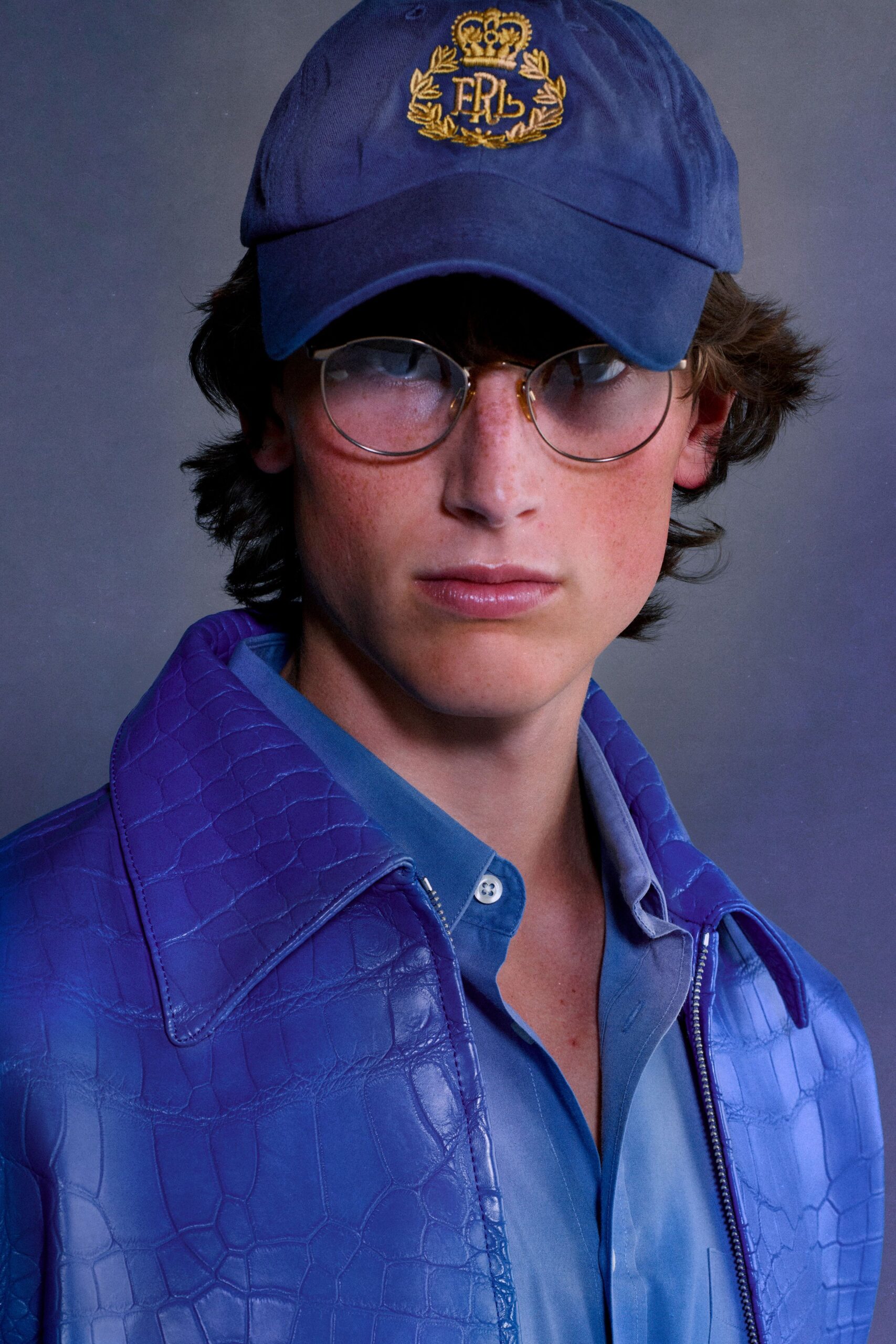 blue leather long-sleeve collared fitted textured jacket