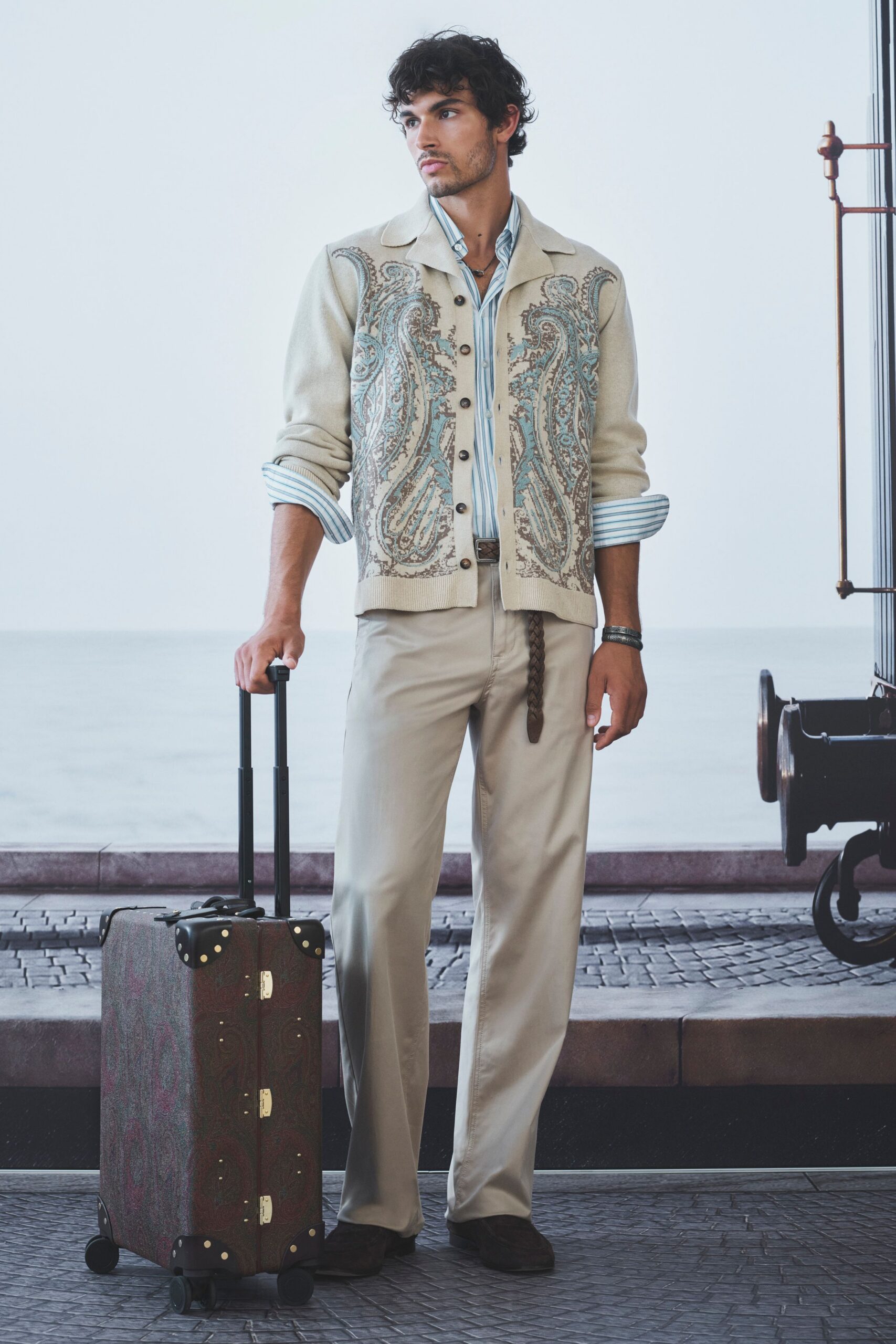 beige embroidered jacket with blue shirt