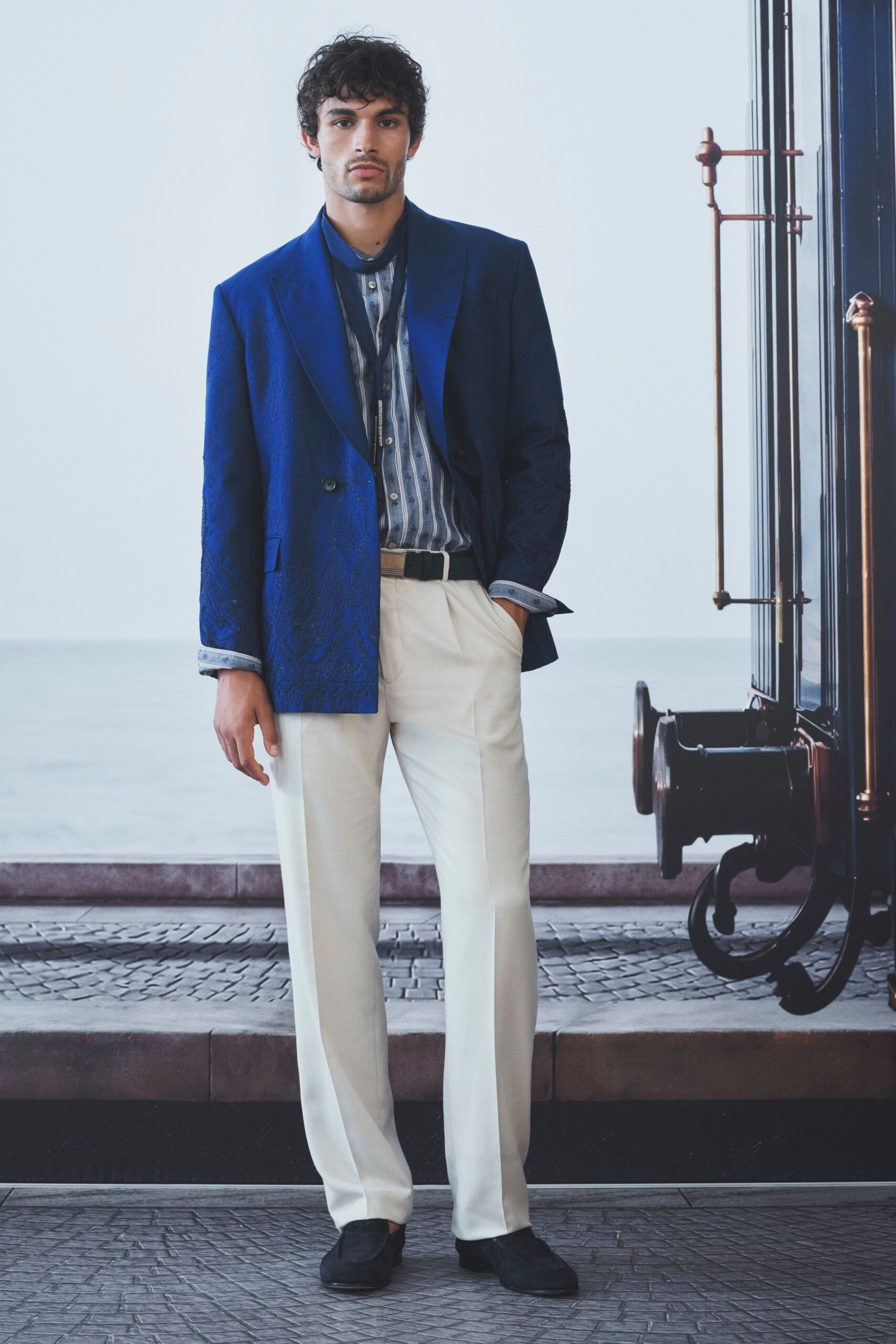 blue tailored blazer with striped shirt