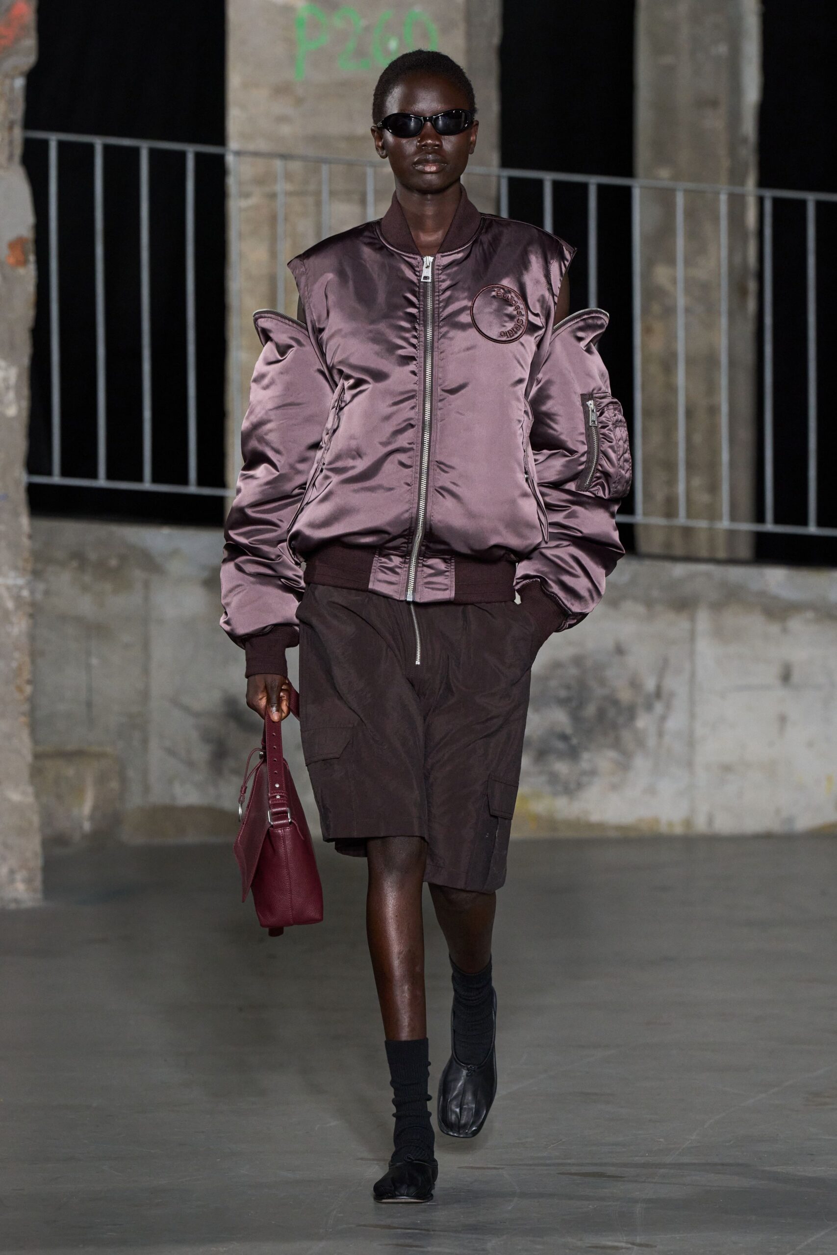 purple oversized jacket with brown skirt