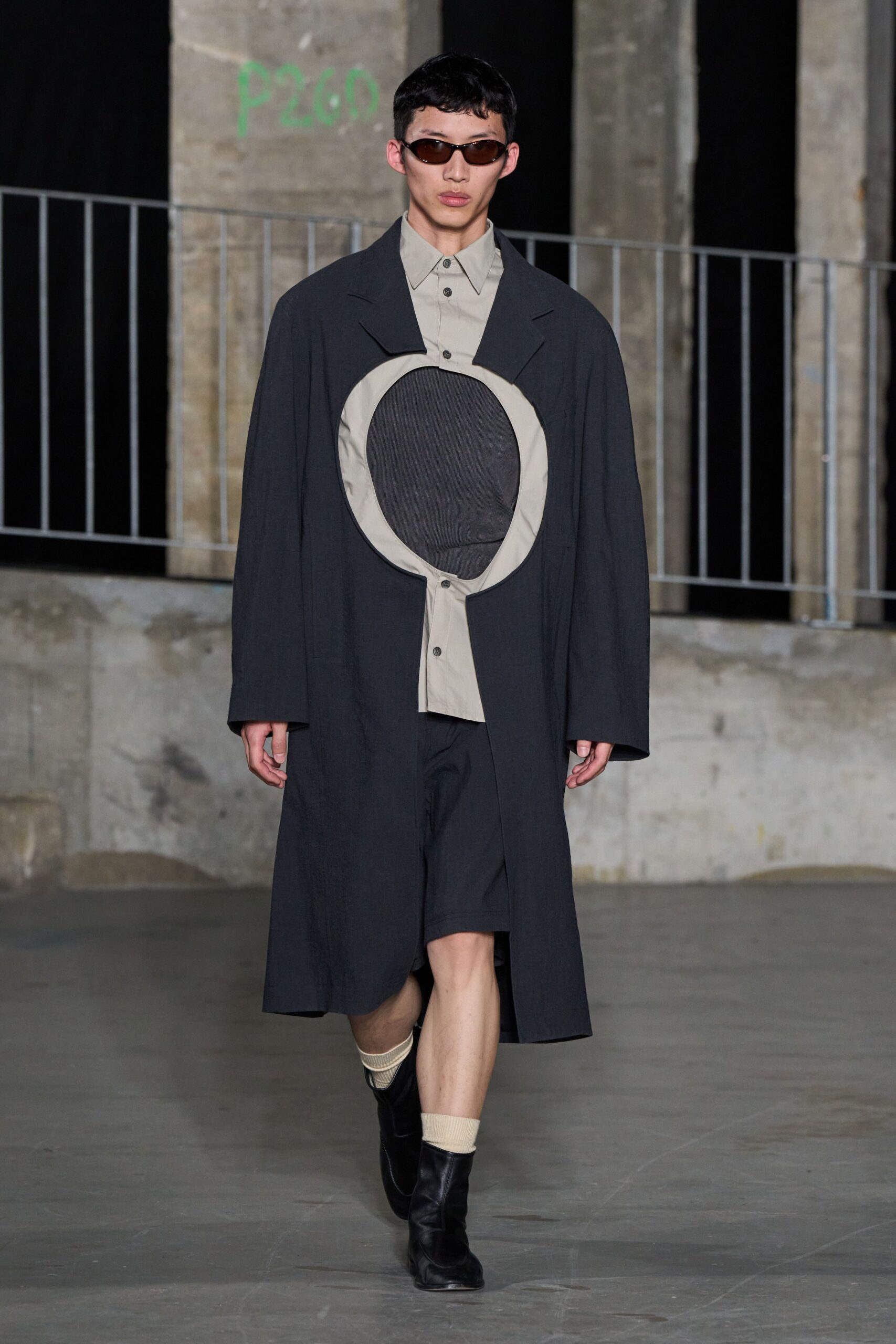 black cotton long-sleeve collared relaxed buttoned coat