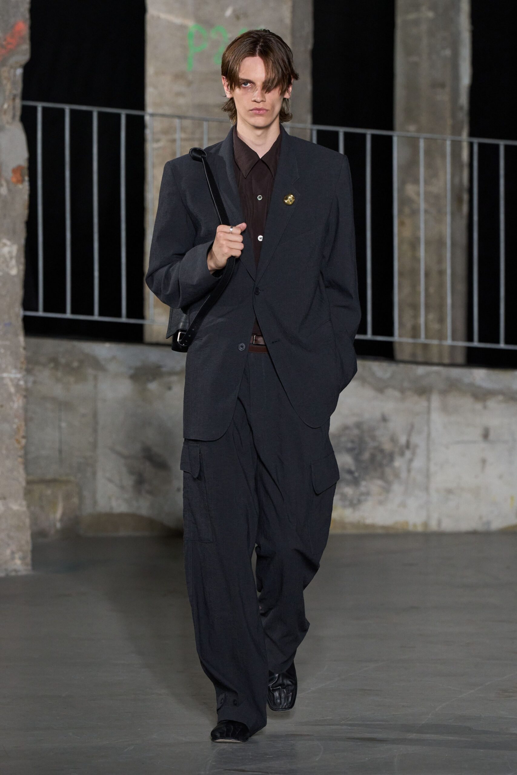 black wool long-sleeve collared tailored buttoned pockets suit