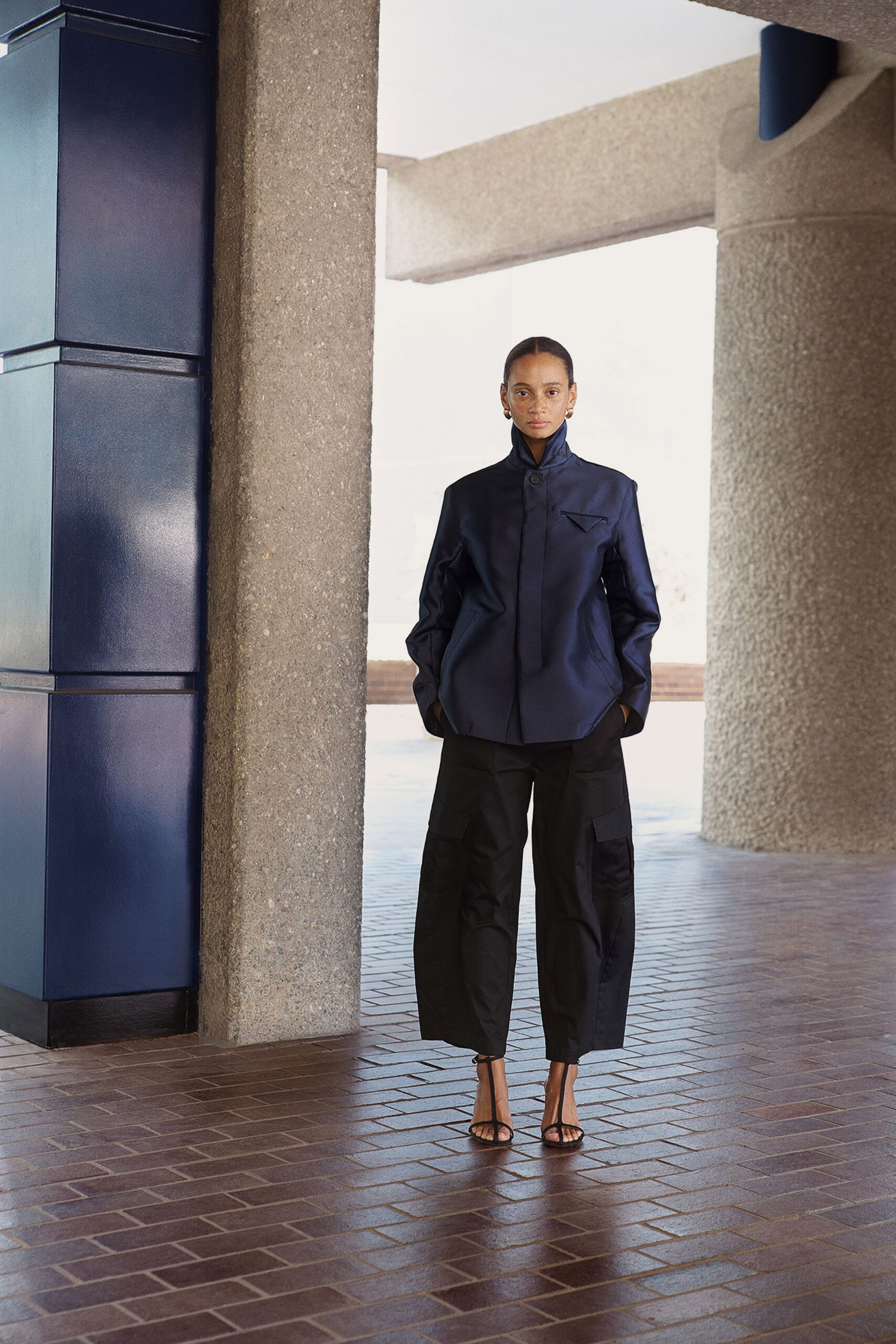 blue relaxed shirt black cargo pants