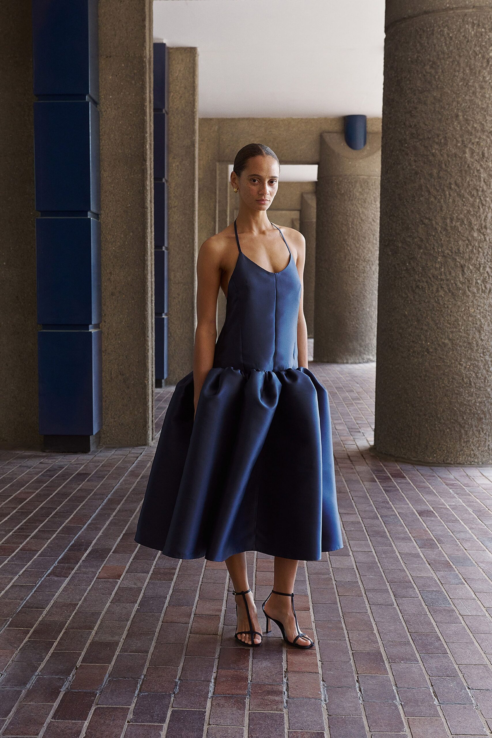 blue silk sleeveless v-neck fitted pleated midi dress