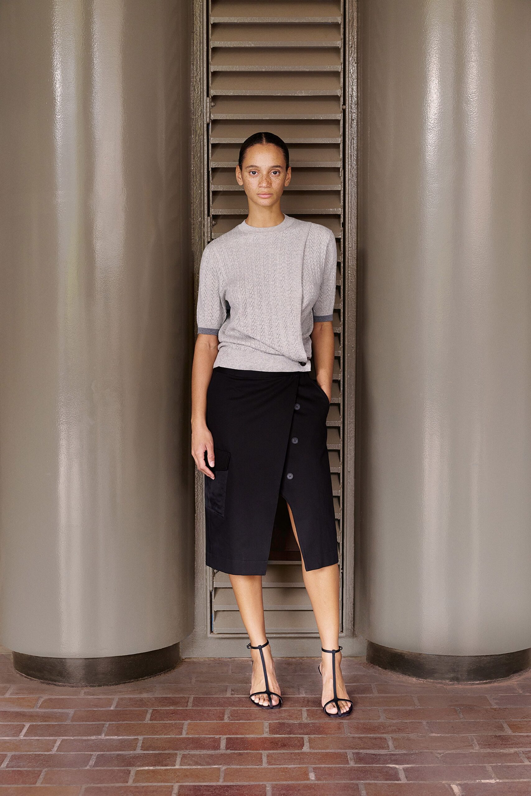 black cotton slit fitted high-waisted buttoned midi skirt