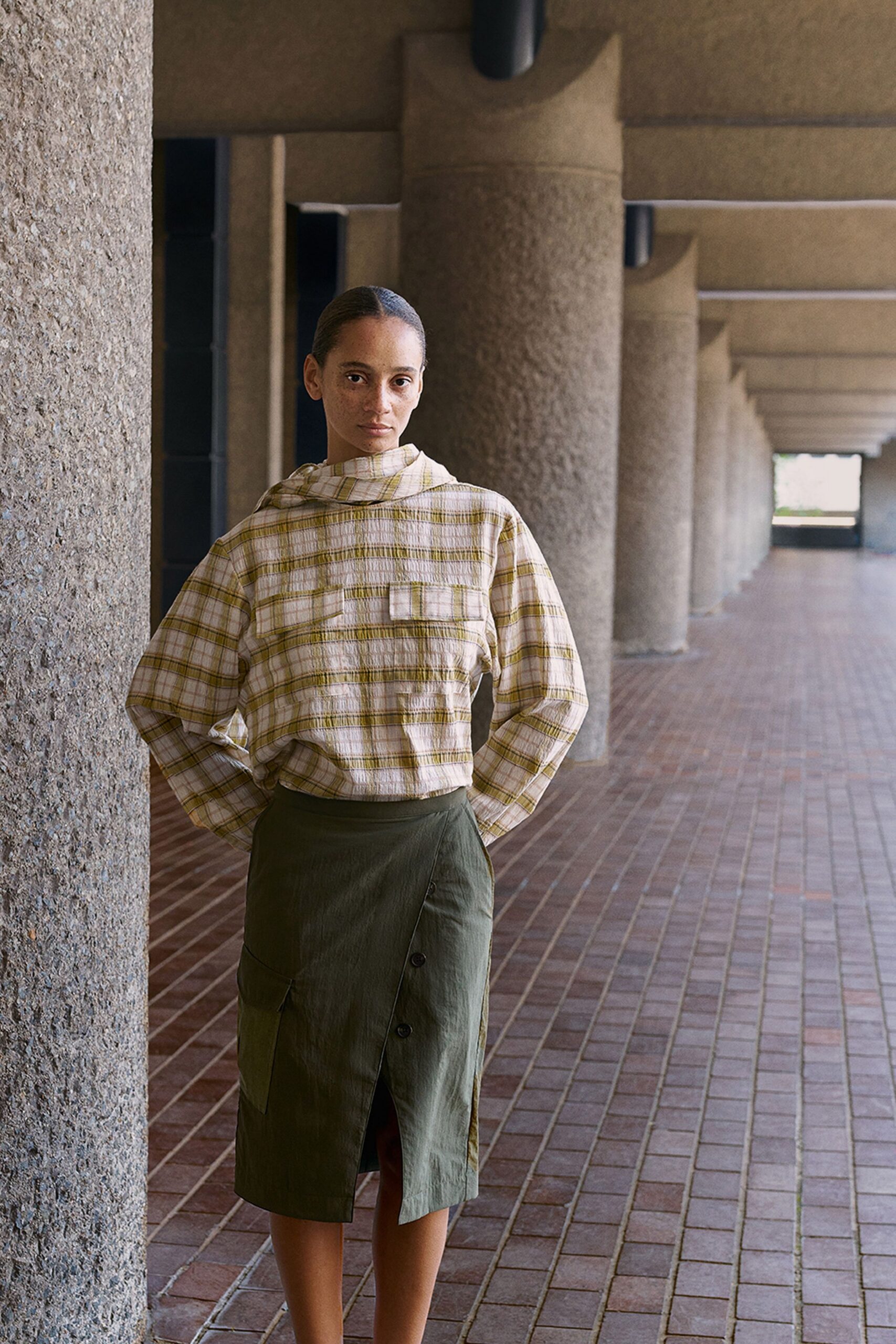 beige checked shirt and green pencil skirt