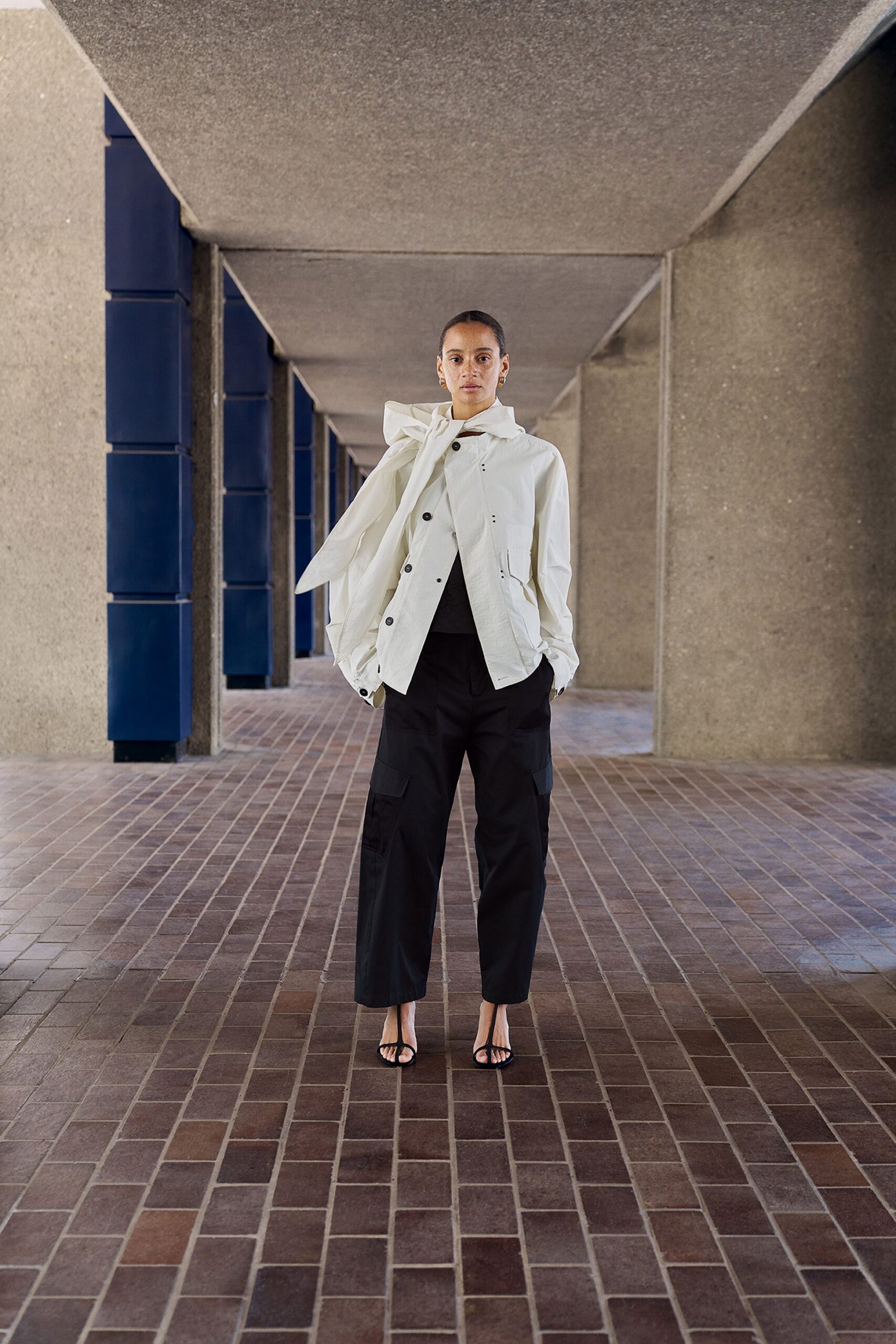 white cotton long-sleeve collared relaxed buttoned jacket