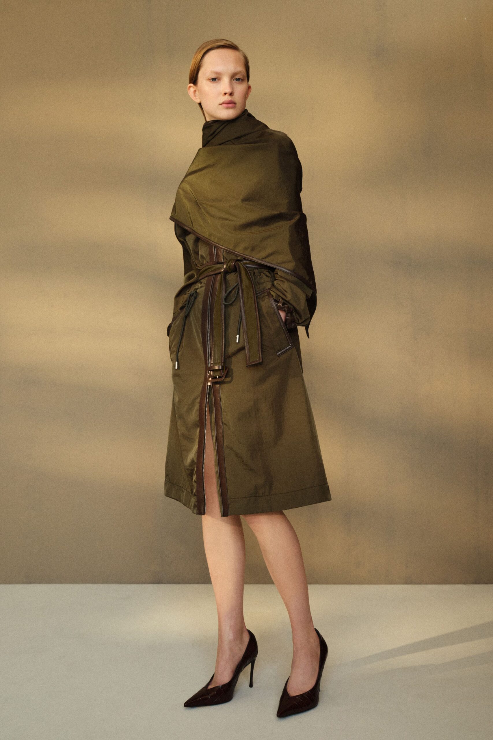 green cotton long-sleeve collared fitted zippered belted coat