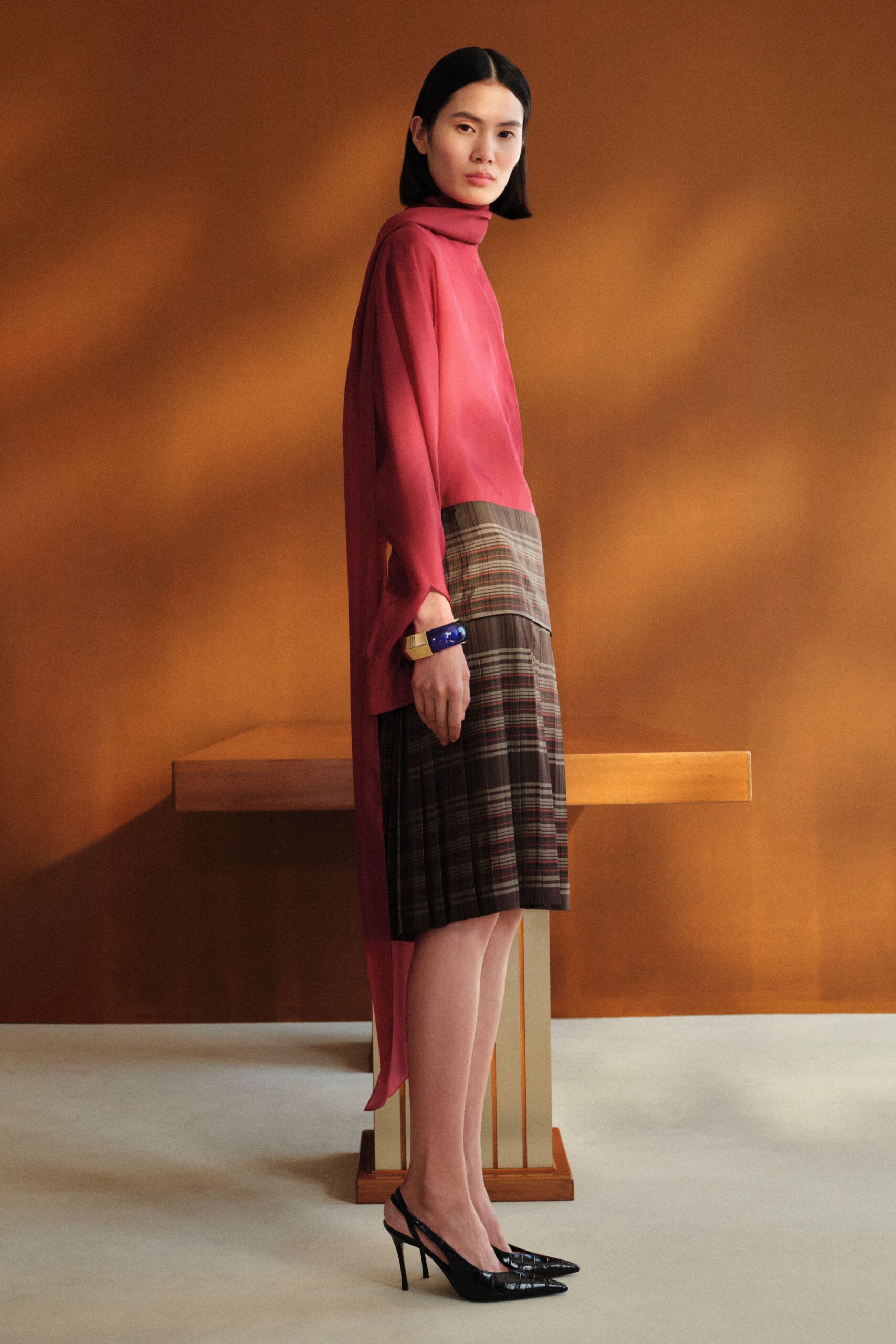 pink silk long-sleeve high-neck fitted layered flowing top