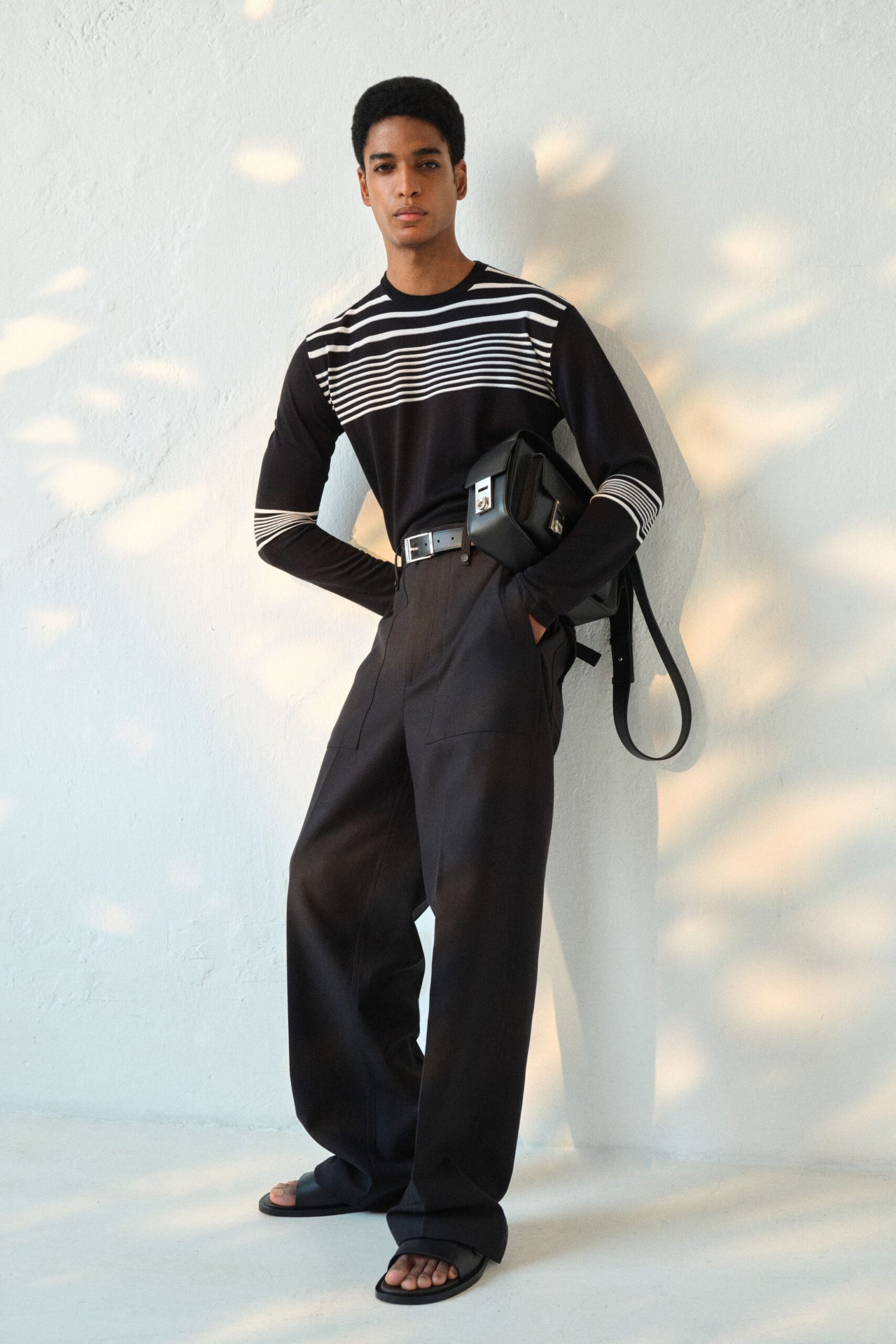 black long-sleeve collared relaxed striped top