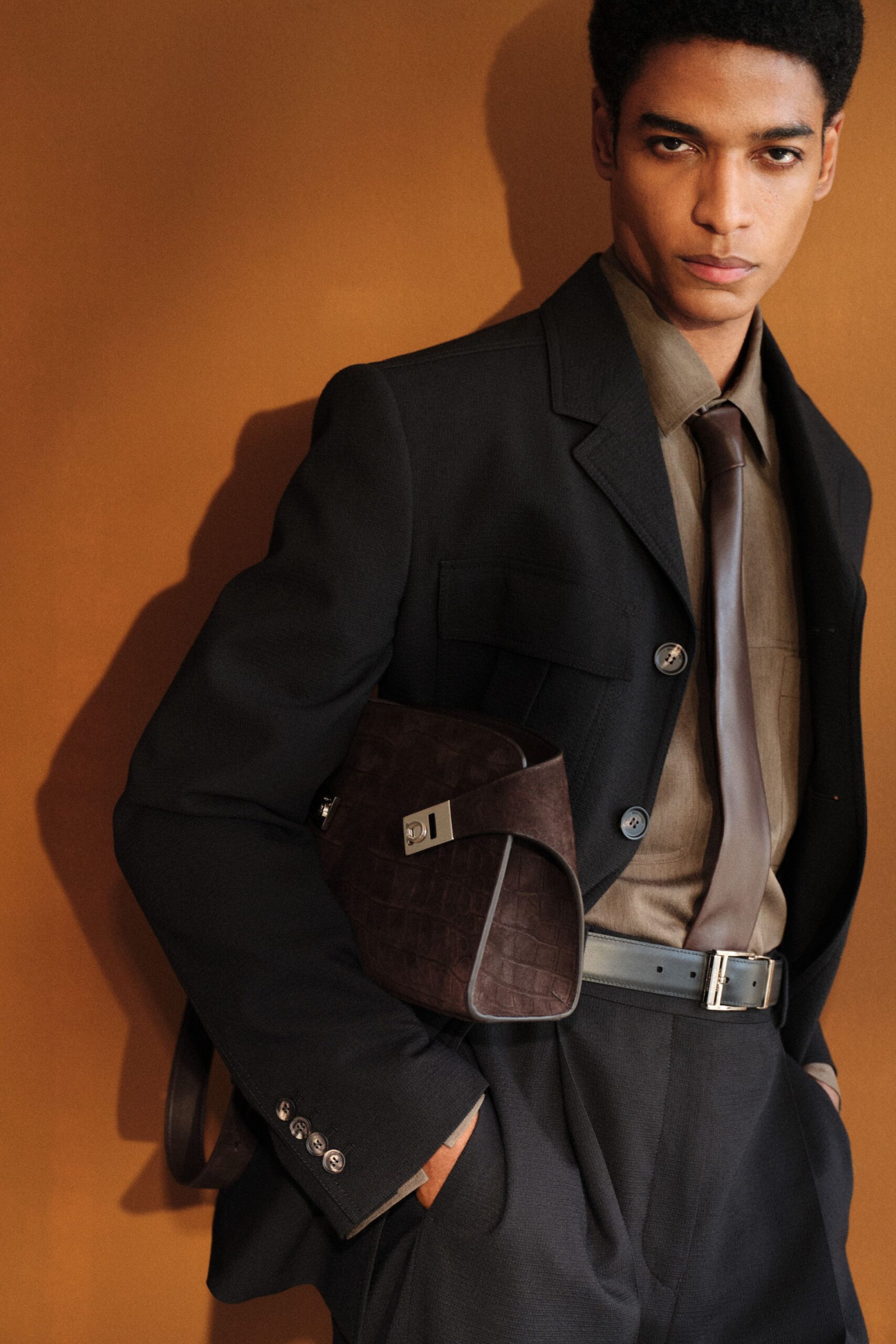 black wool long-sleeve collared tailored buttoned suit