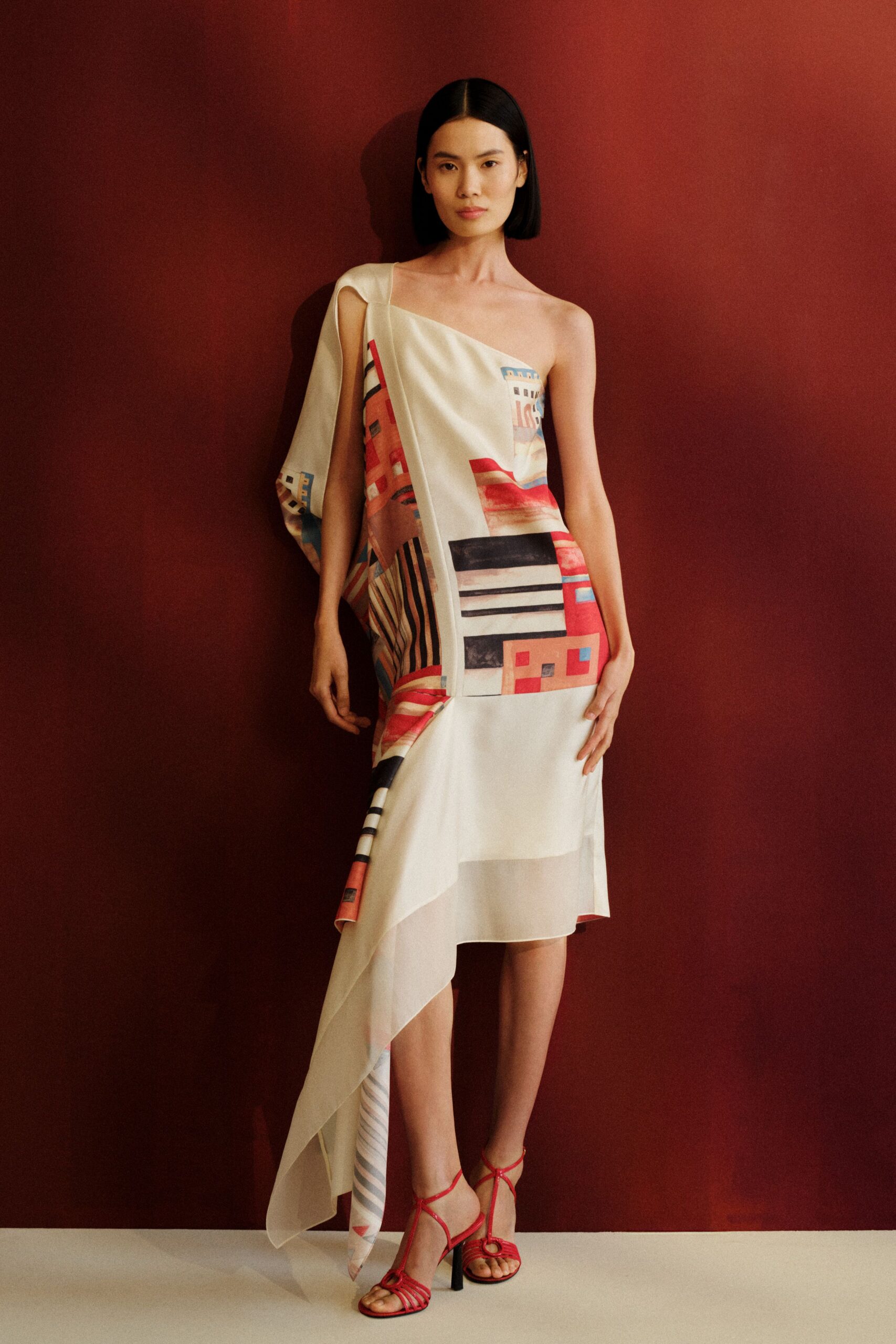 white silk sleeveless asymmetric fitted printed draped dress