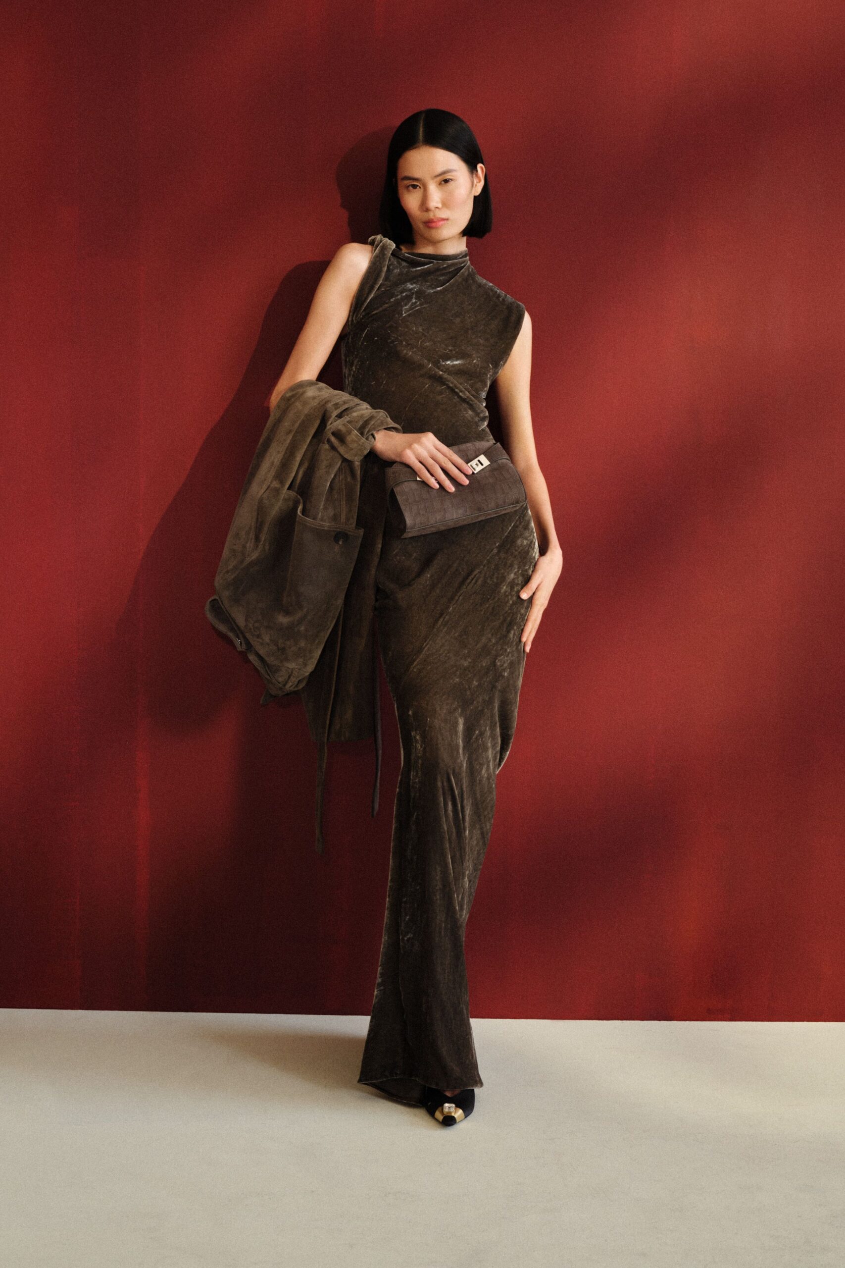 brown velvet sleeveless high-neck fitted draped shiny gown