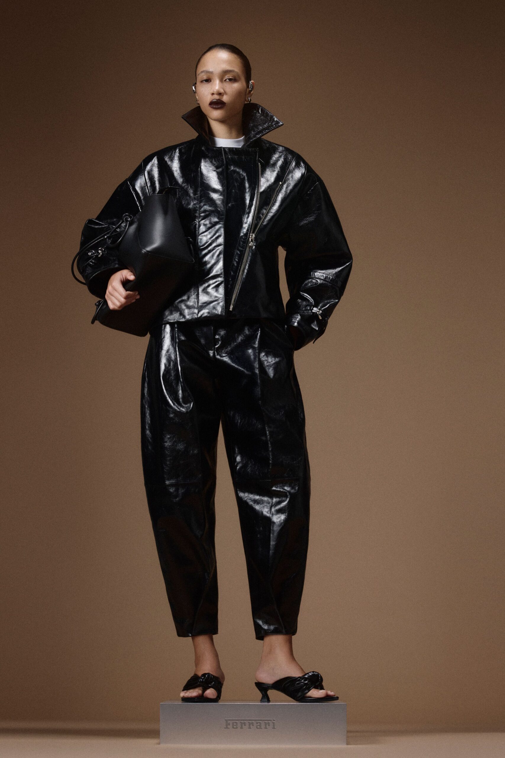 black vinyl long-sleeve collared oversized zippered shiny jacket