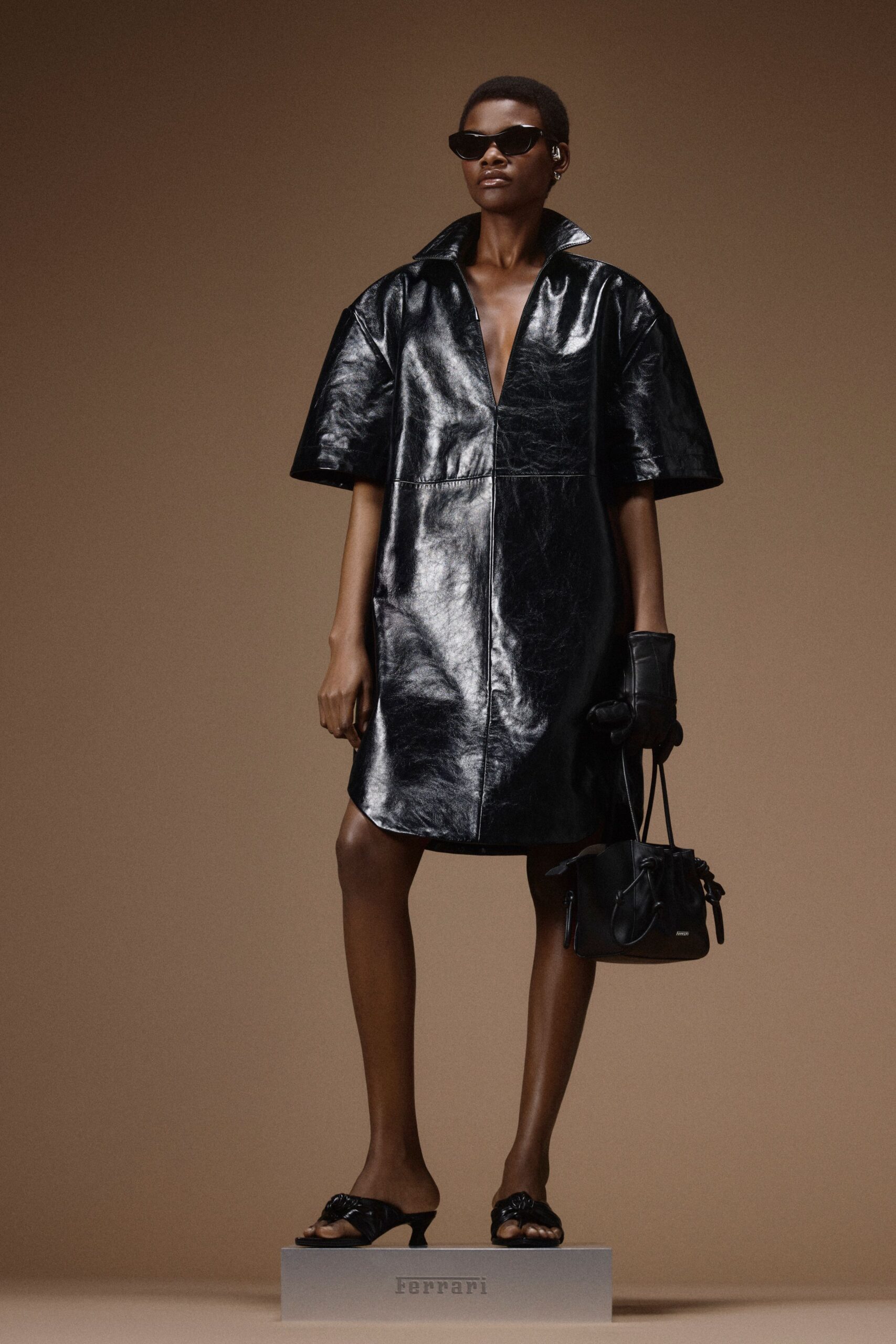 black leather short-sleeve v-neck fitted zippered shiny dress