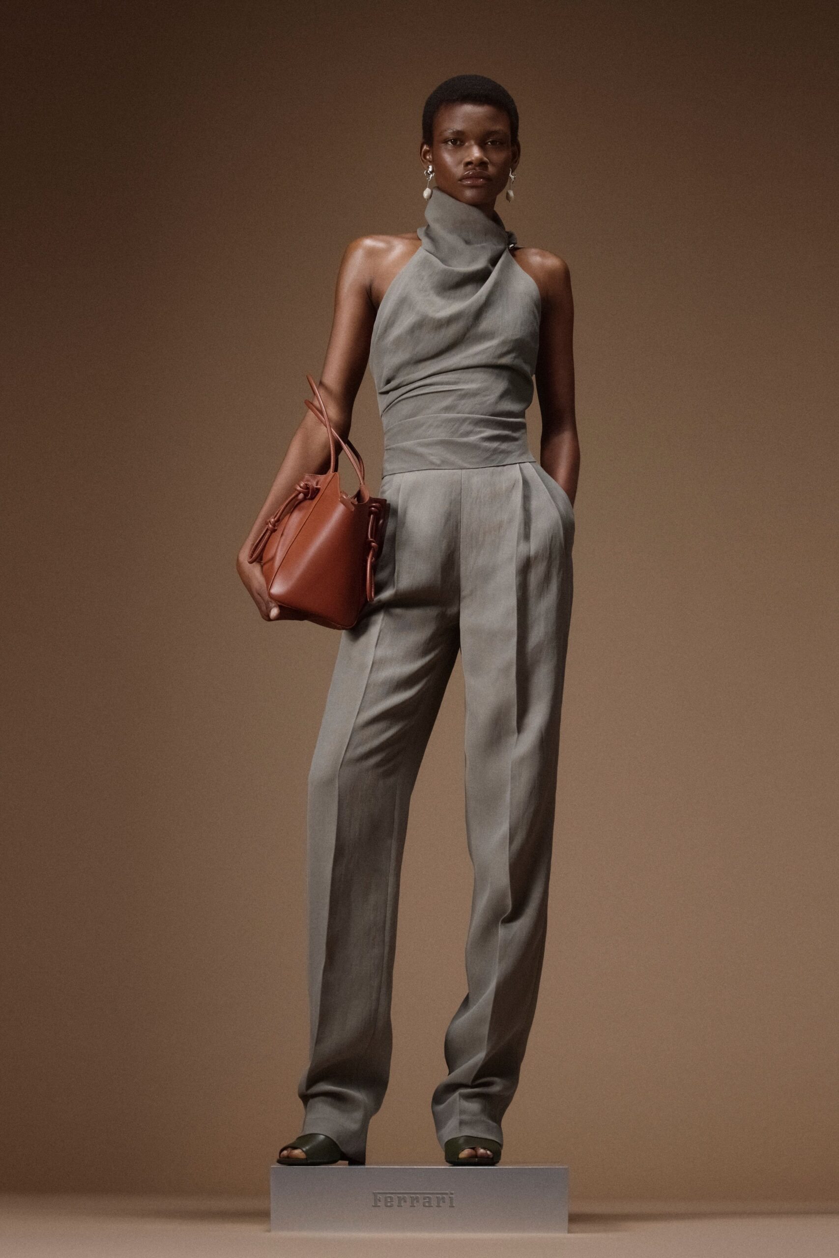 gray silk sleeveless high-neck fitted straight-leg jumpsuit