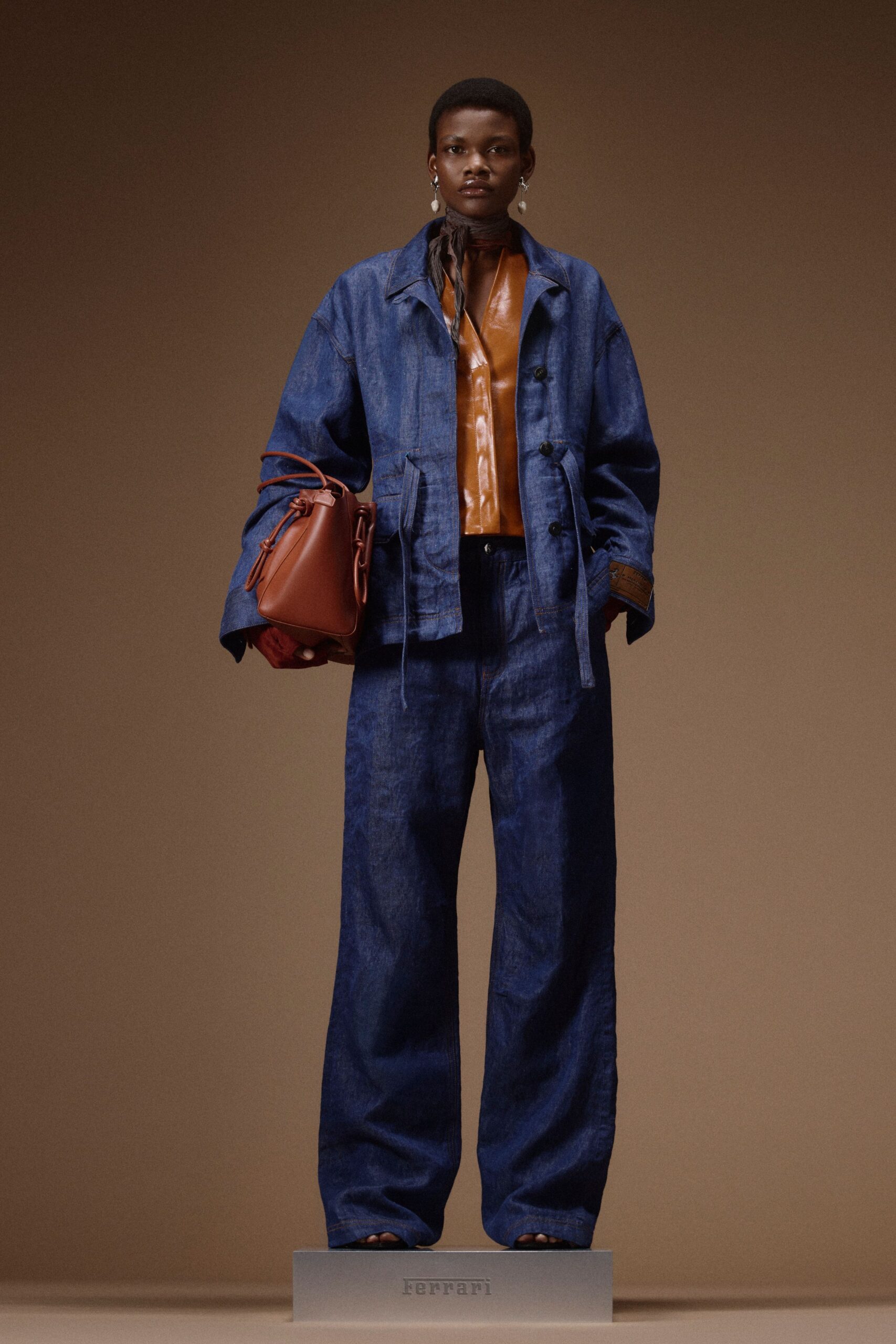 blue denim jacket with orange top