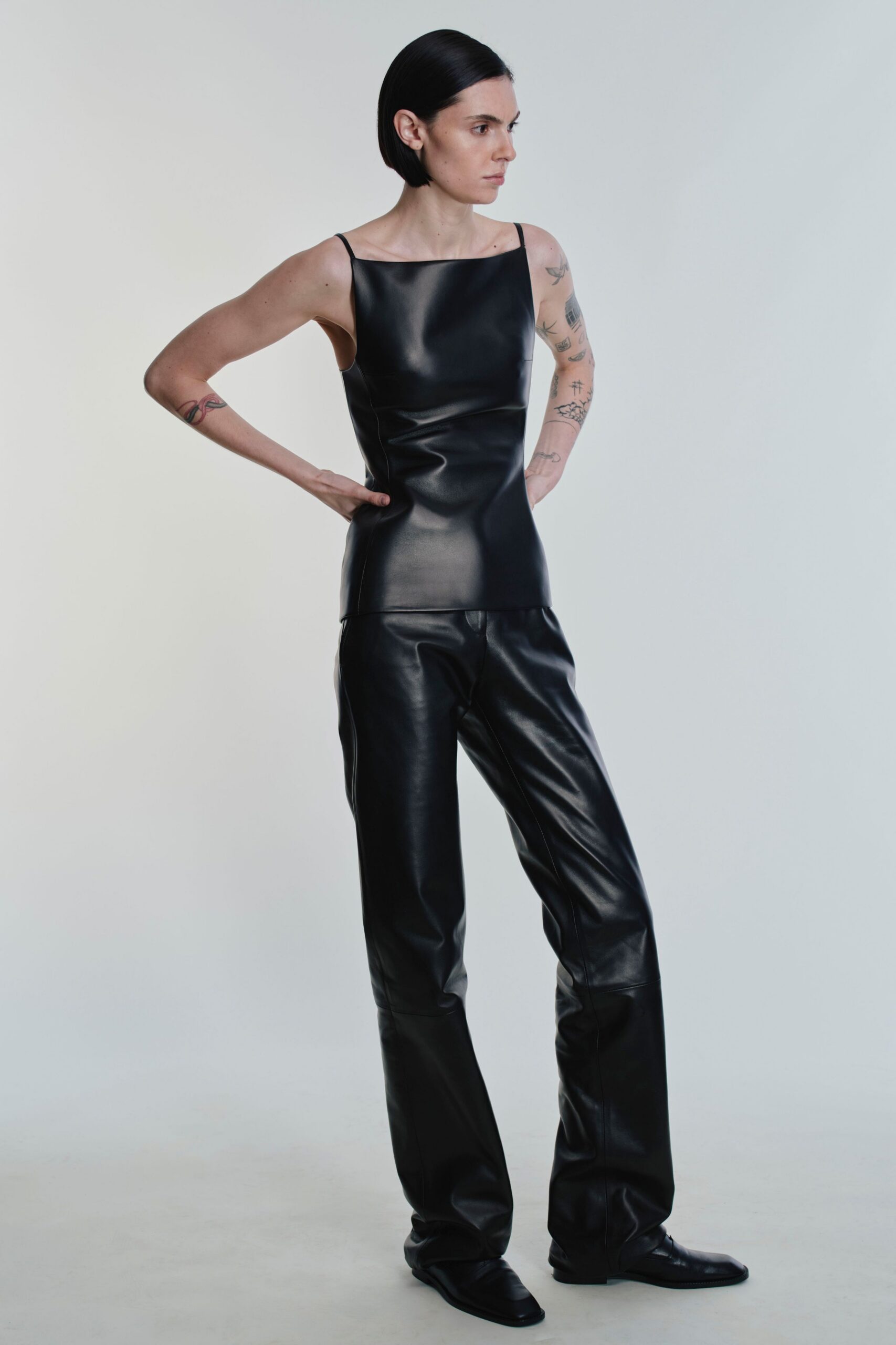 black leather fitted straight-leg pants