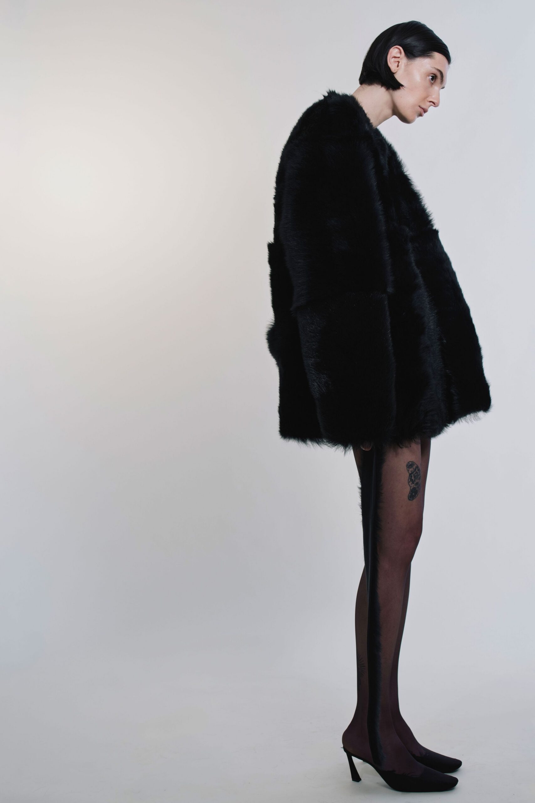 black faux-fur oversized coat