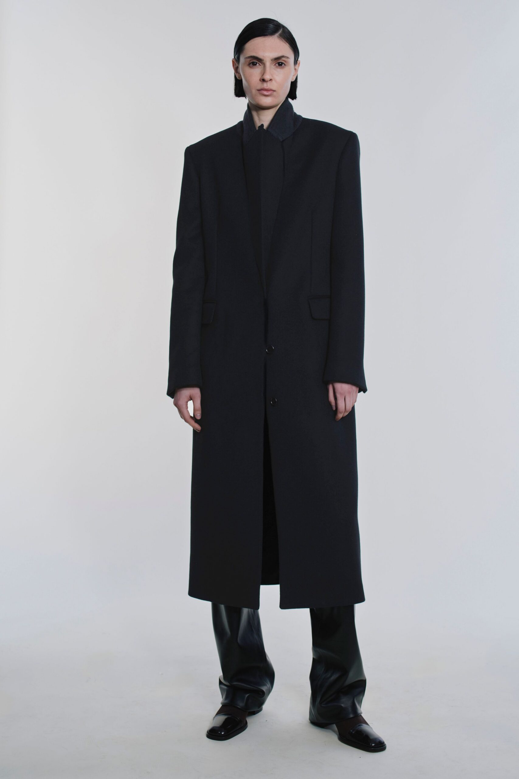 black wool long-sleeve collared structured buttoned maxi coat