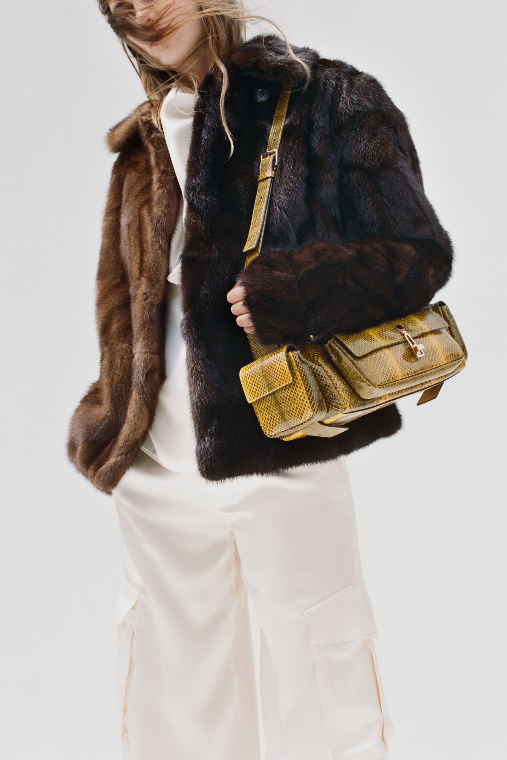 brown fur coat with silk top