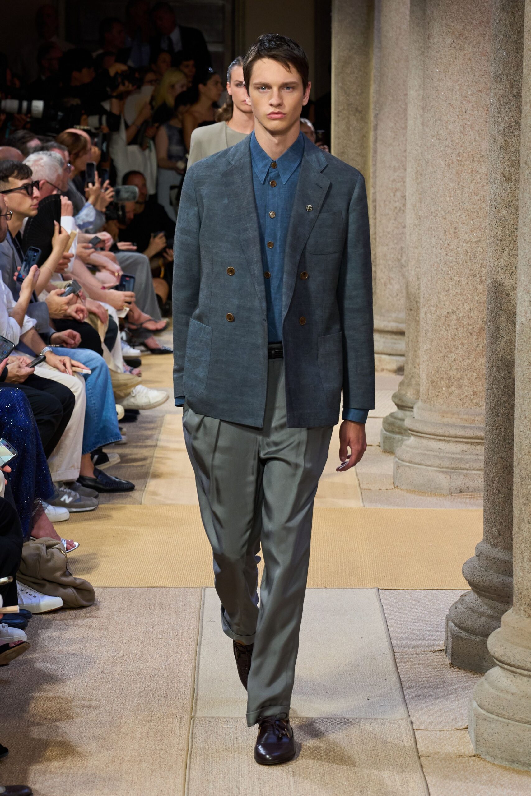 blue tailored blazer with gray pants