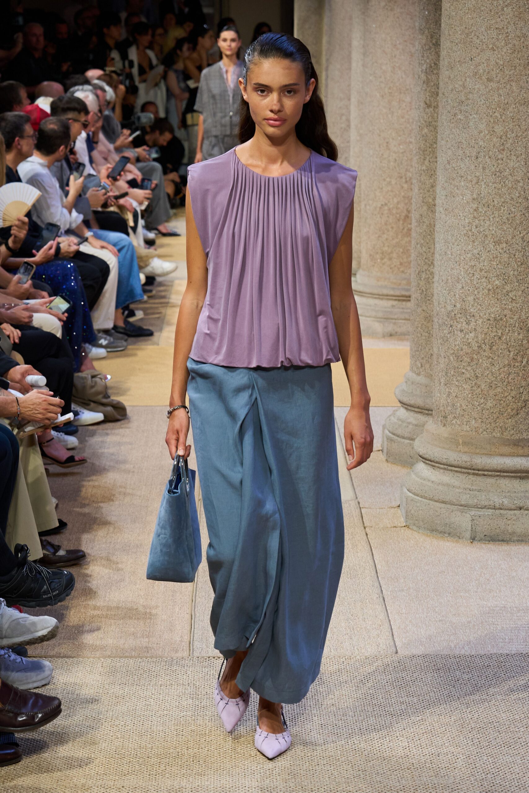purple pleated top with blue maxi skirt