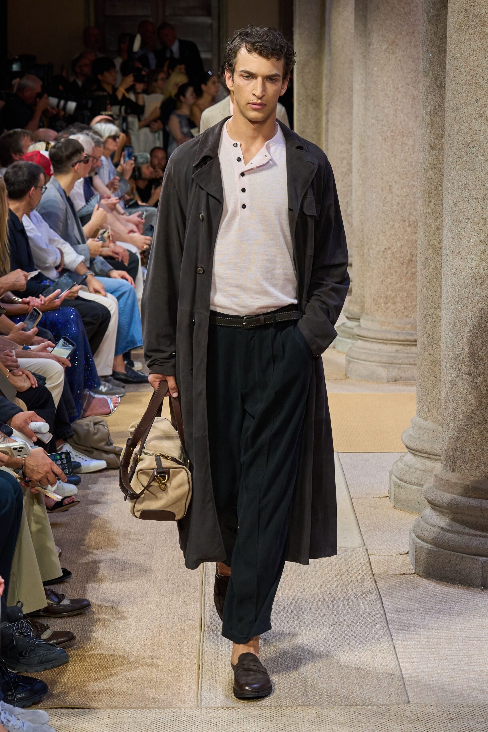 black cotton long-sleeve collared relaxed buttoned trench