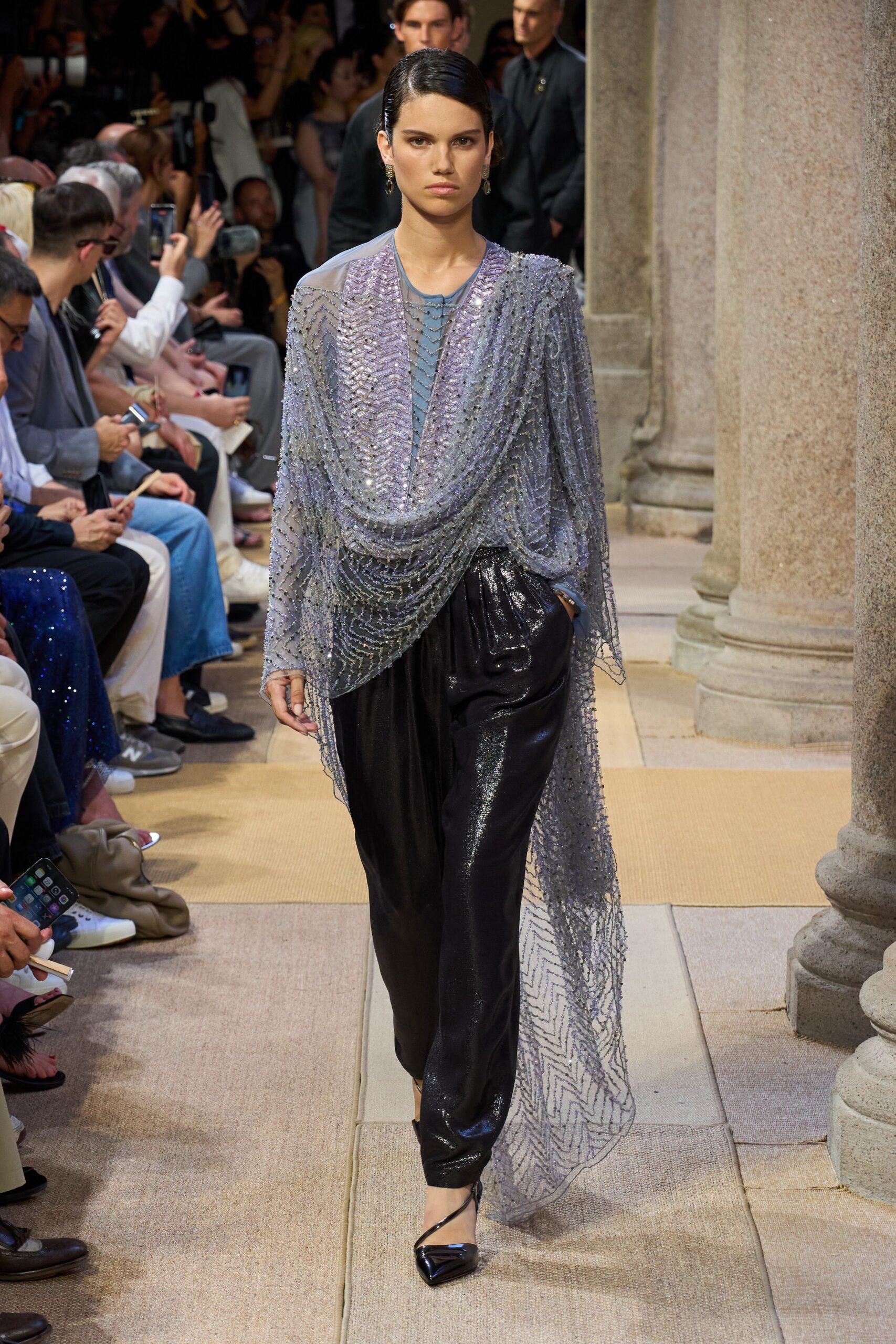 gray silk top with black pants