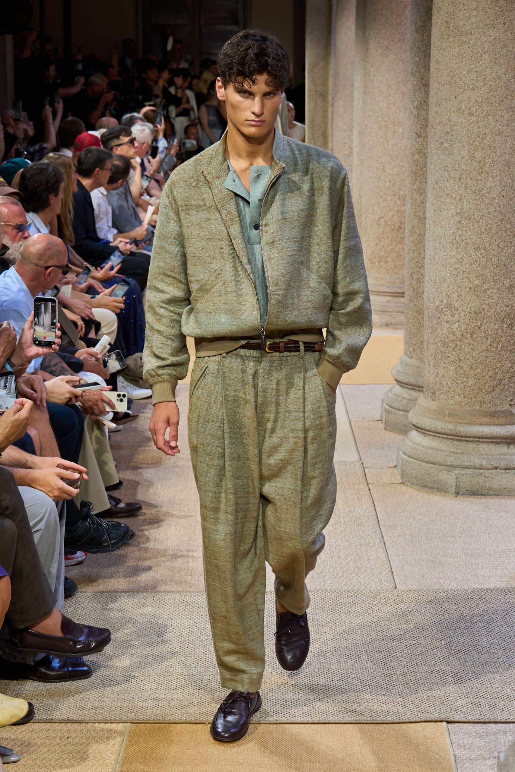 green relaxed shirt beige pants