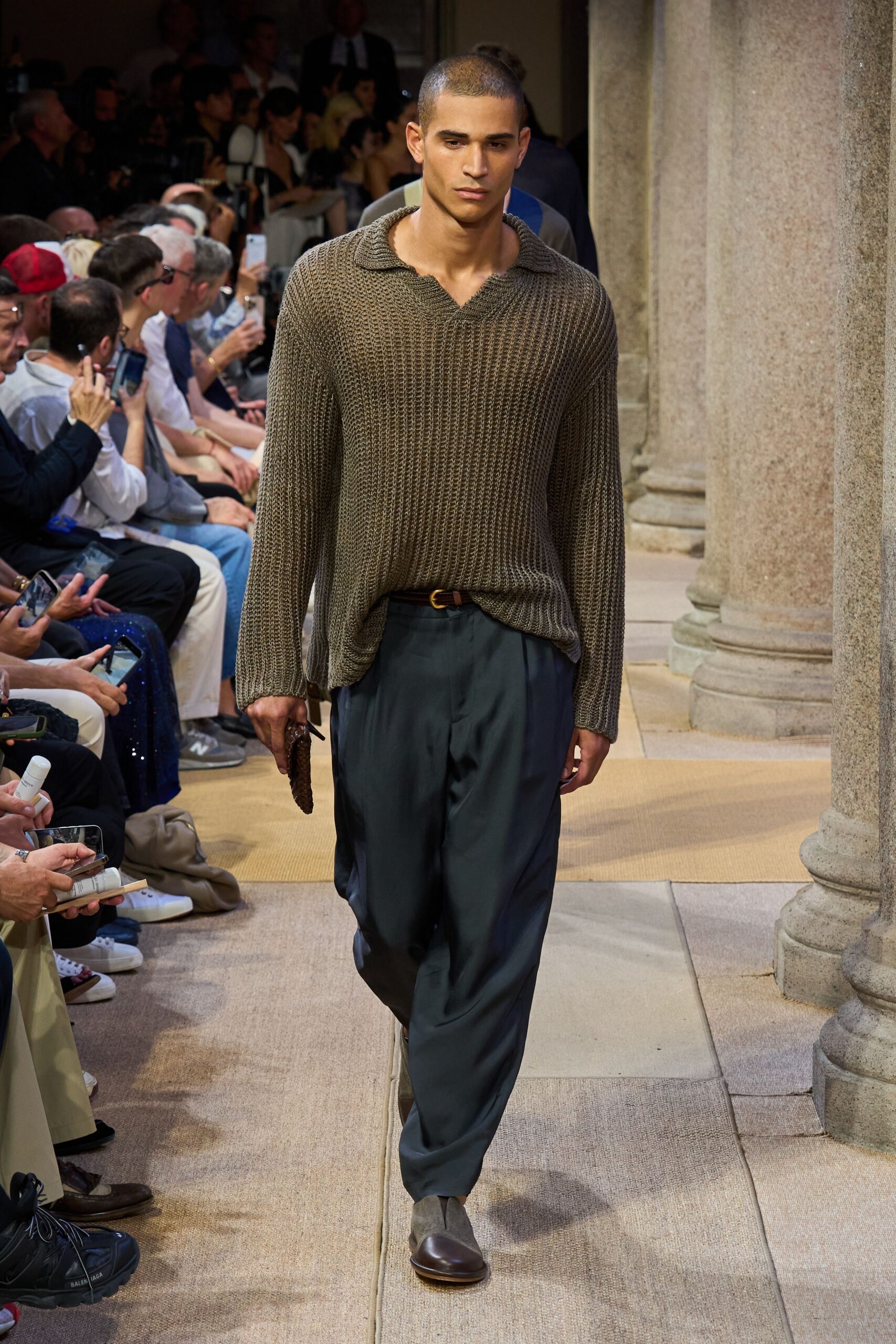 brown relaxed sweater with black pants