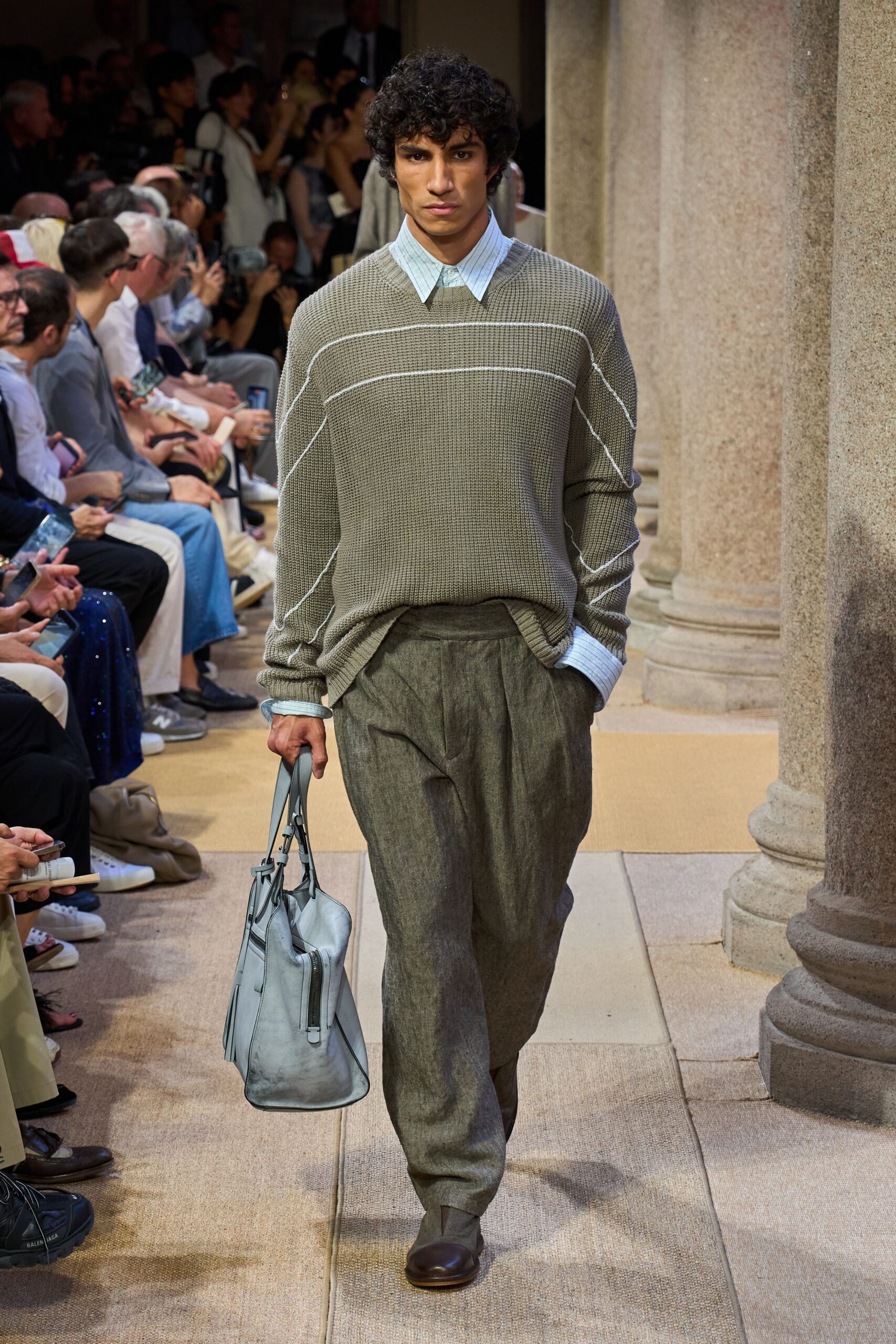 gray relaxed sweater with beige pants