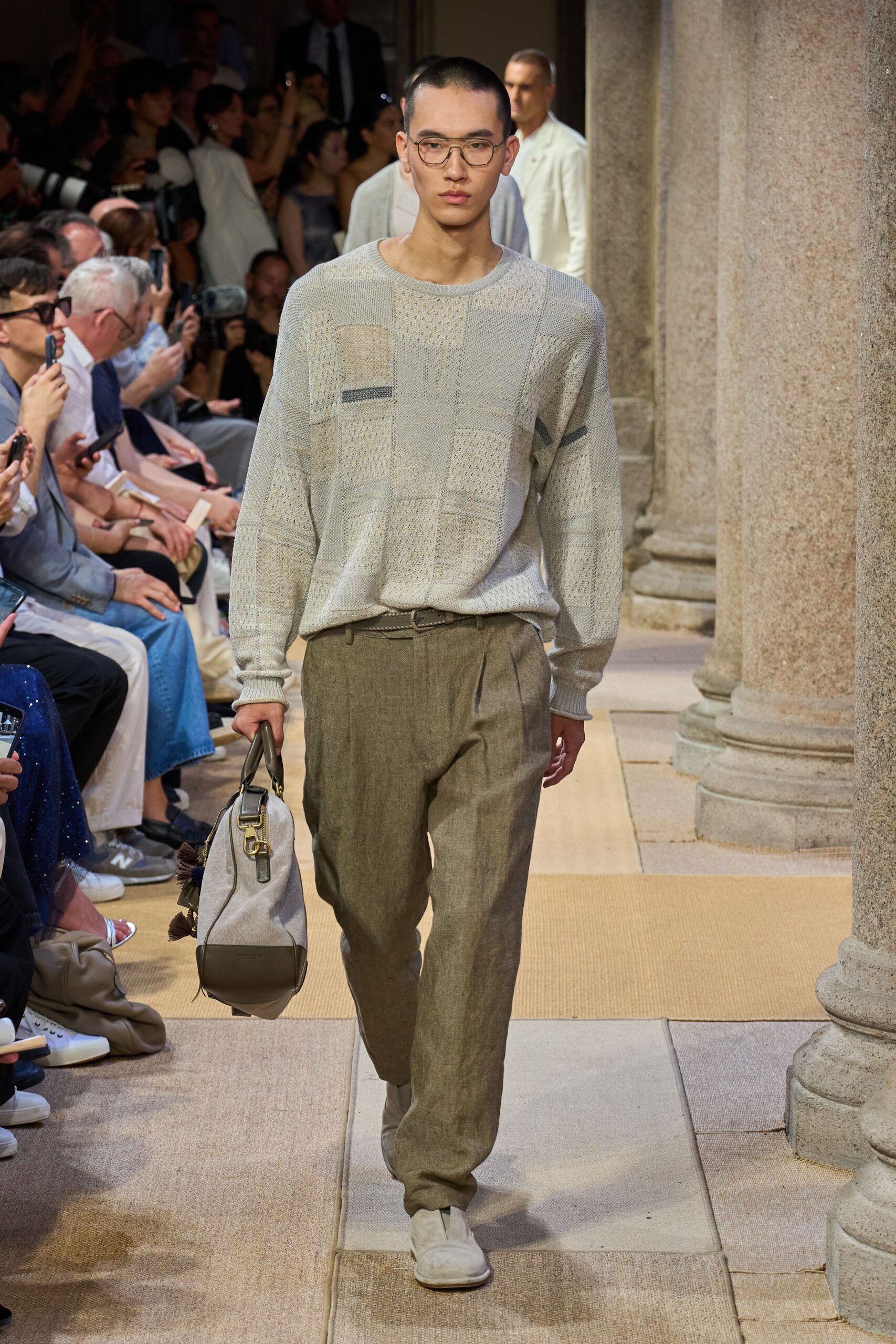 gray relaxed sweater with beige pants