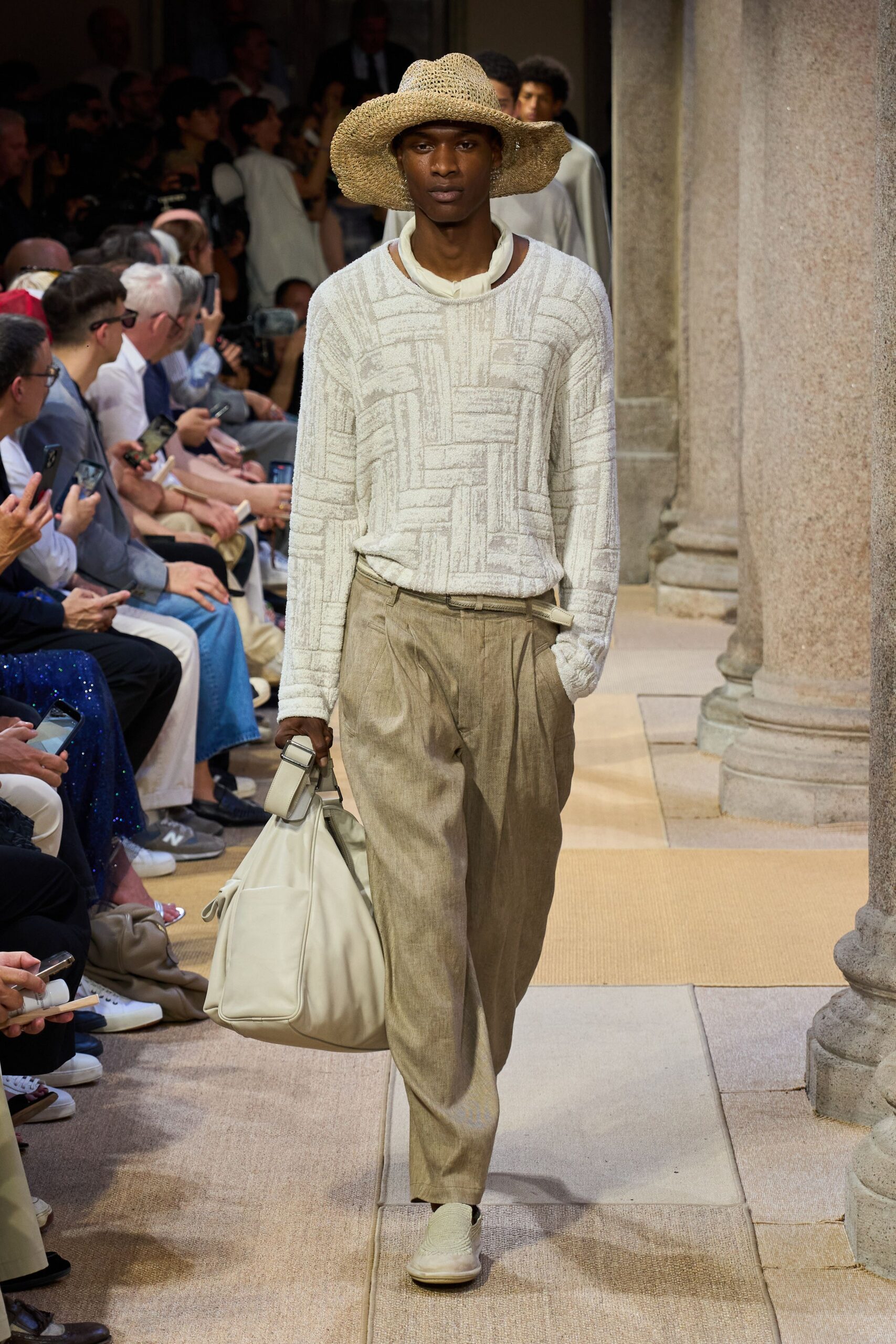 white relaxed shirt beige pants