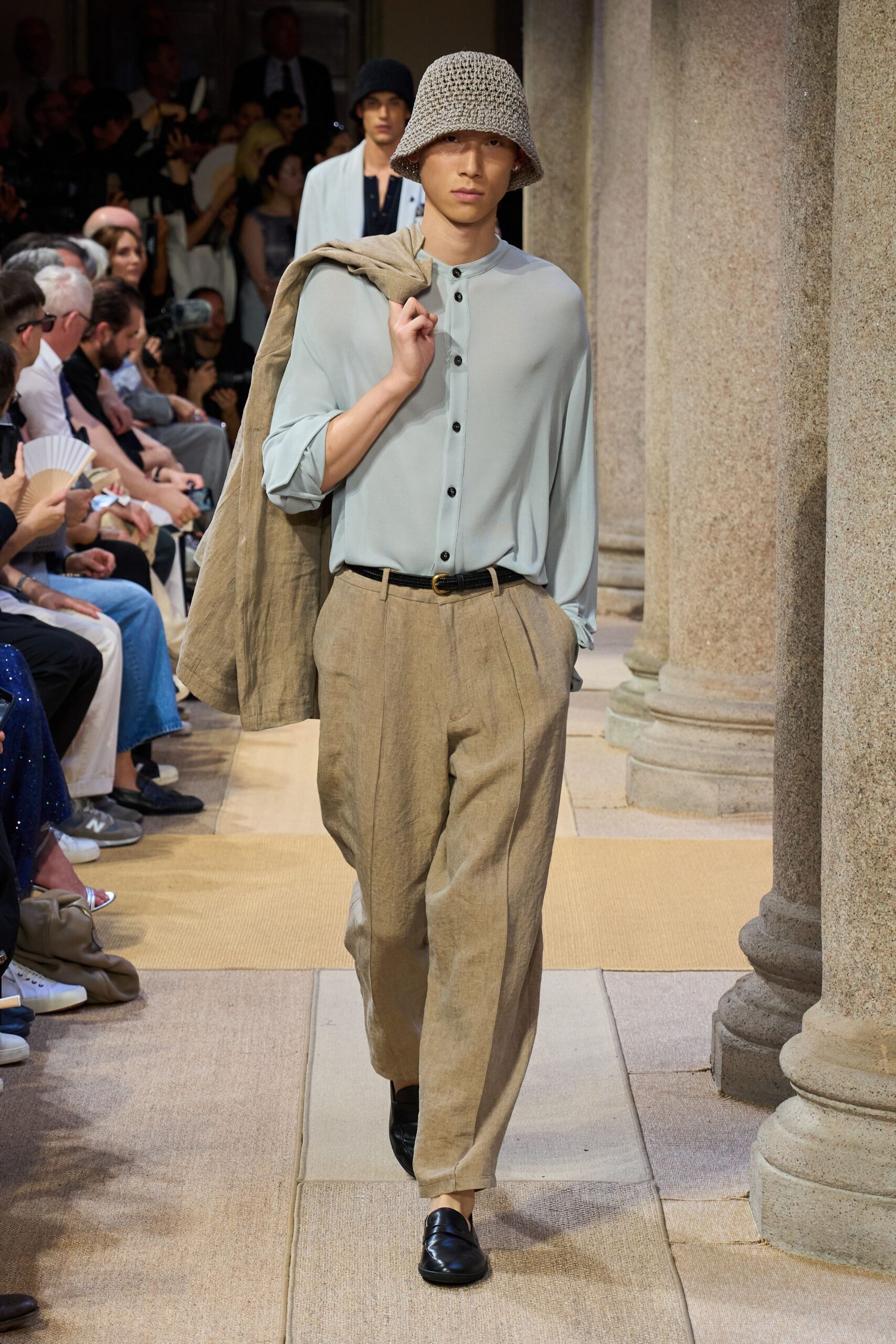 light blue shirt beige pants