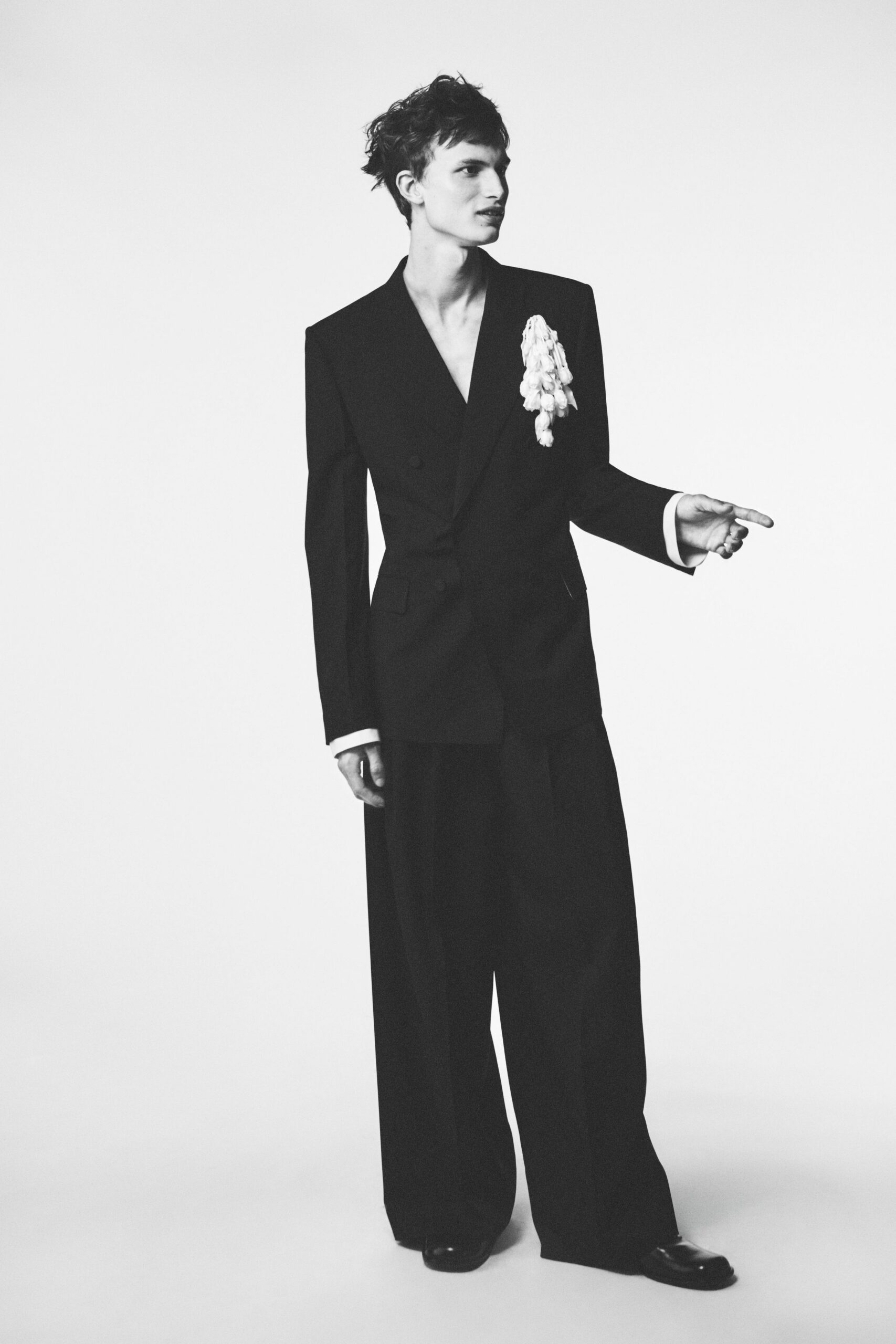 black wool long-sleeve v-neck tailored buttoned suit