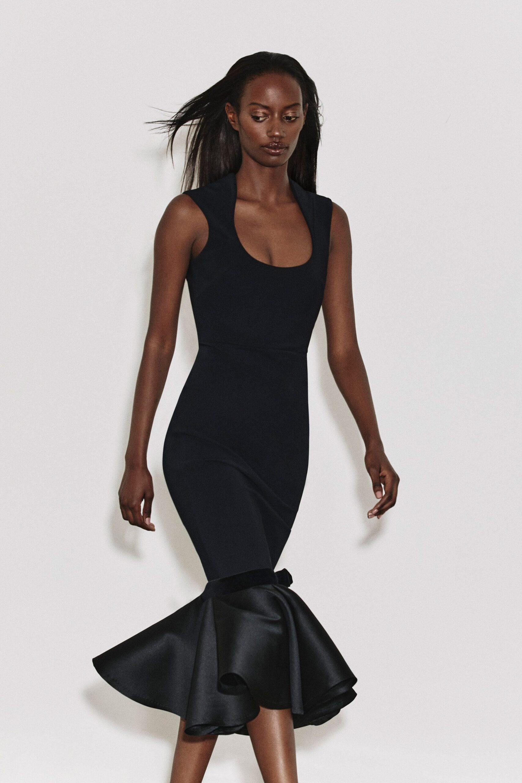 black fitted sleeveless dress