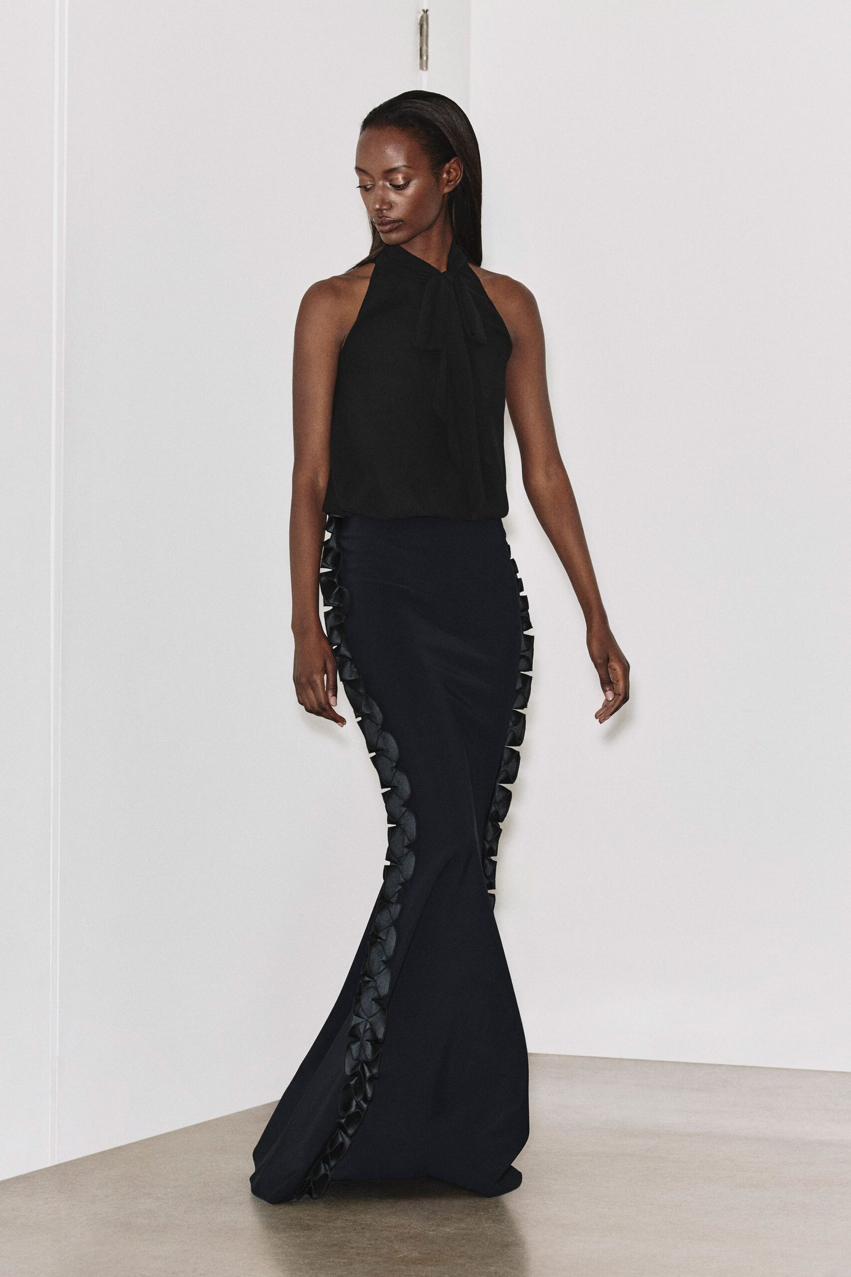 black silk long-sleeve fitted flared maxi gown