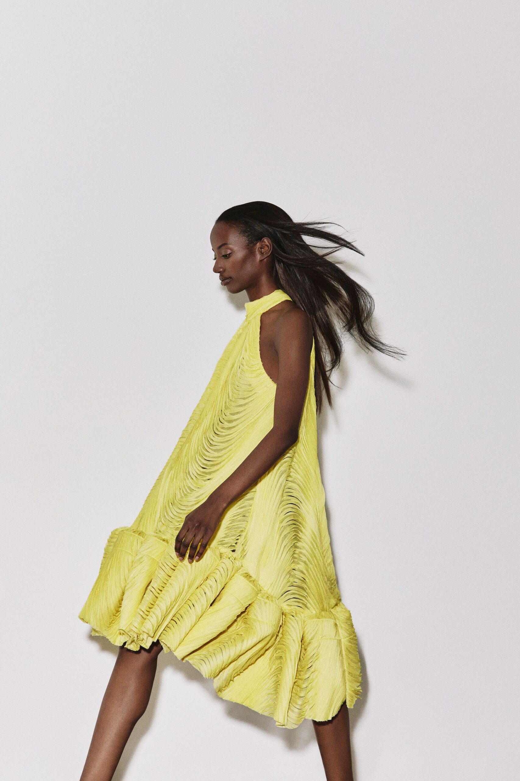 yellow pleated midi dress