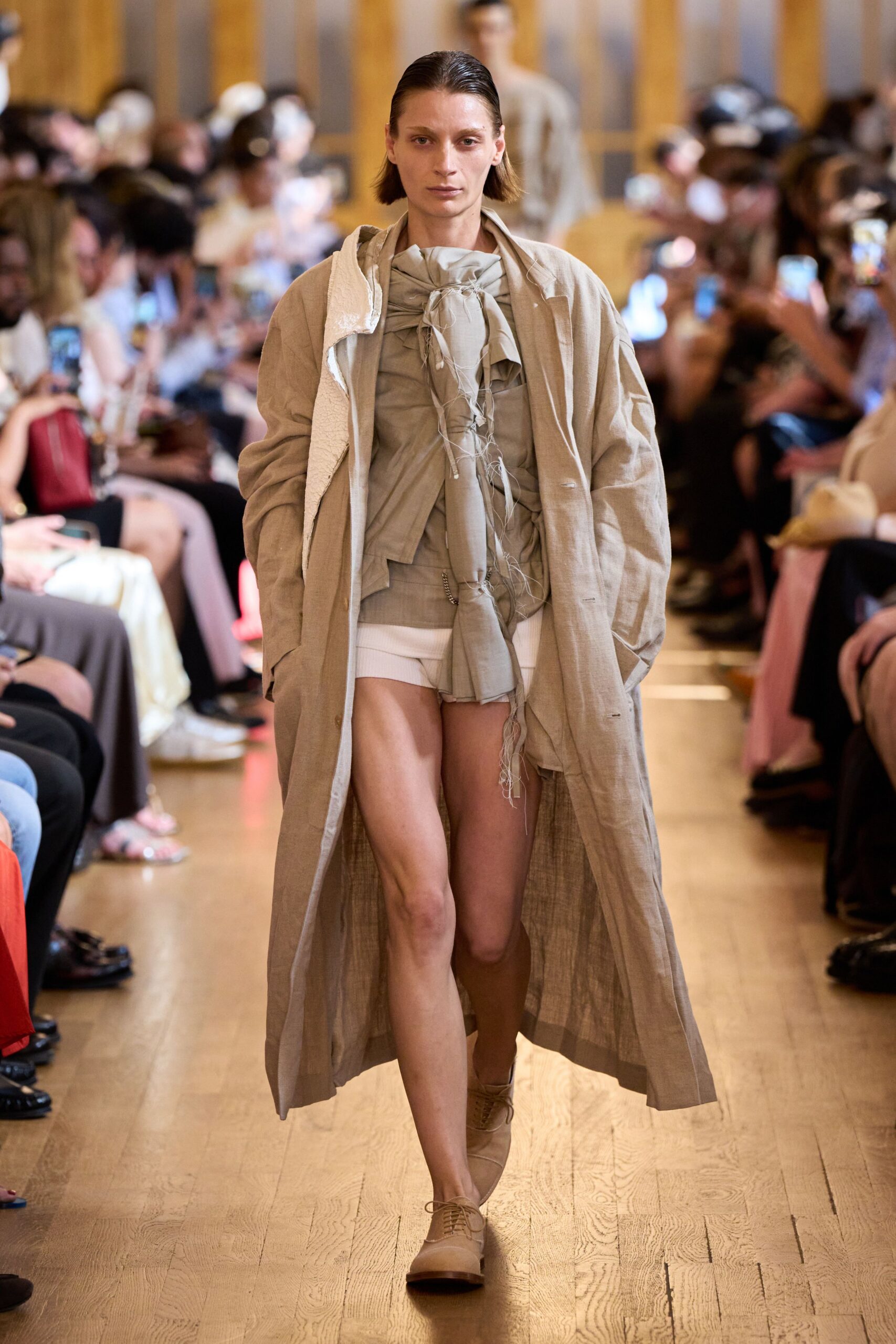 beige linen coat gray ruffled top white shorts