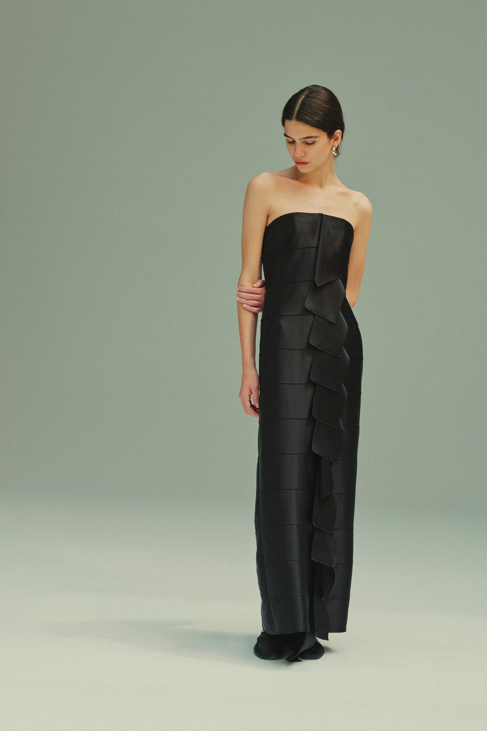 black silk strapless fitted pleated maxi gown