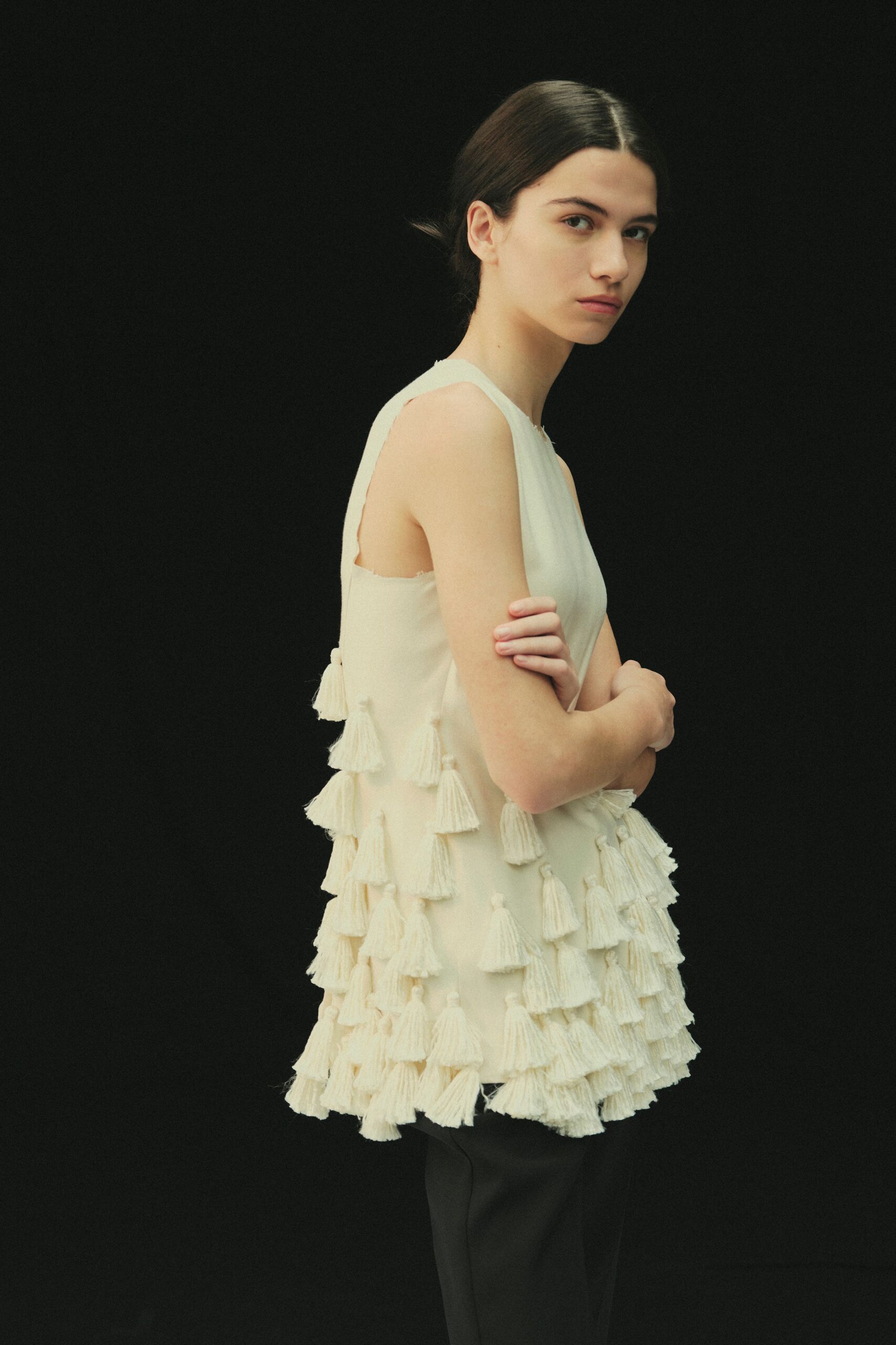 ivory cotton sleeveless relaxed ruffled top