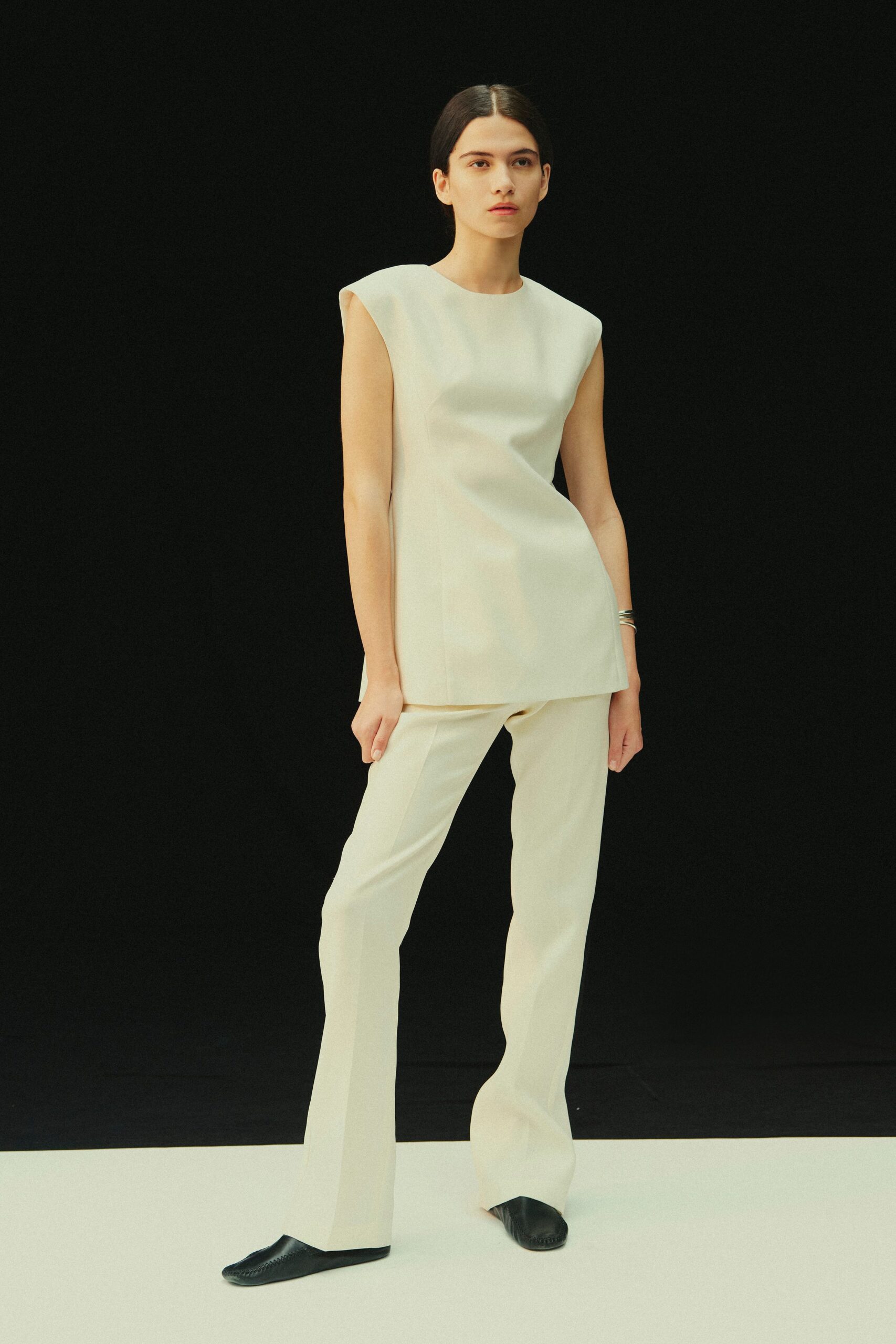 white cotton long-sleeve fitted flared pants