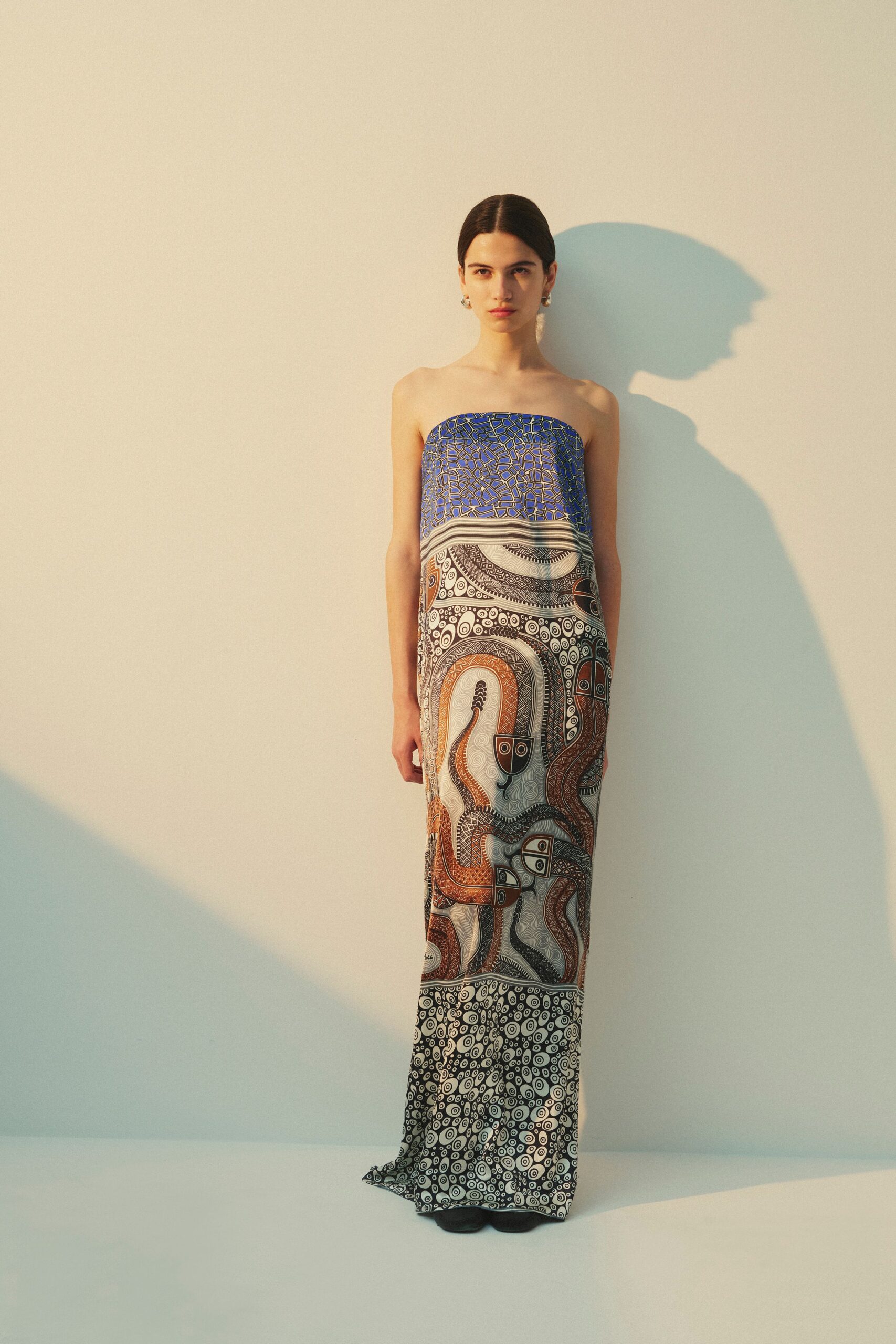 blue multi printed strapless gown