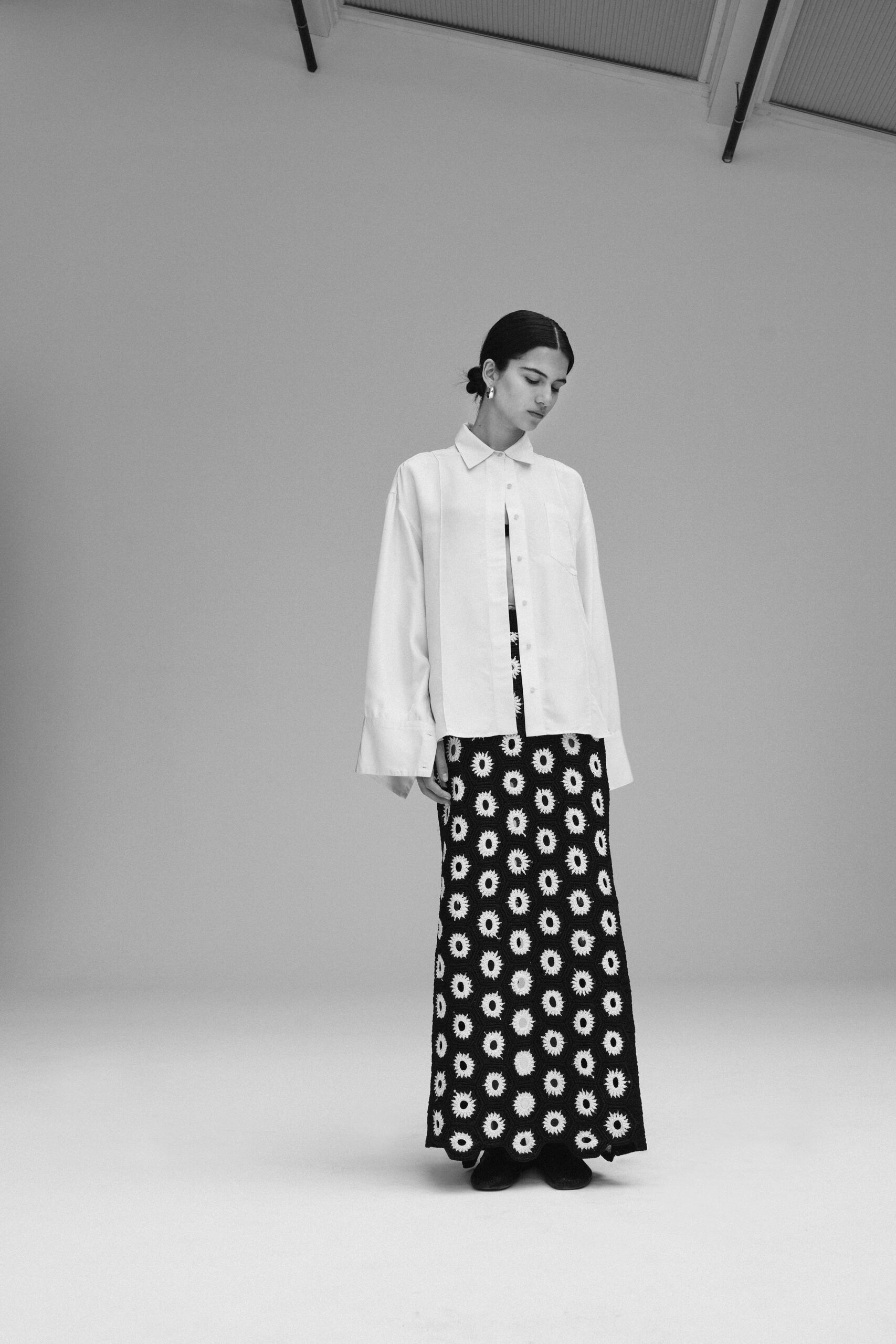 black cotton fitted flared maxi skirt