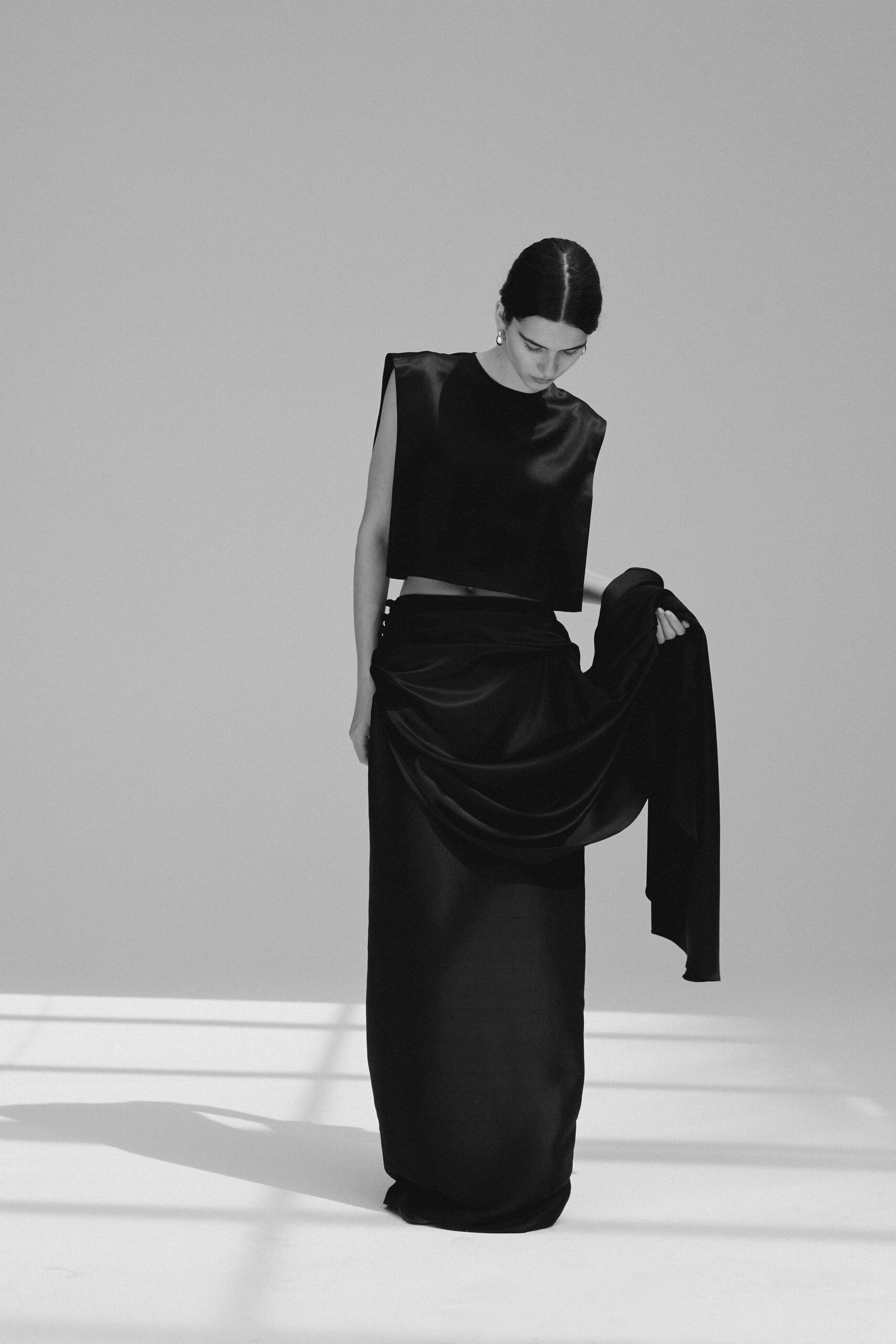 black silk sleeveless high-neck fitted cropped top